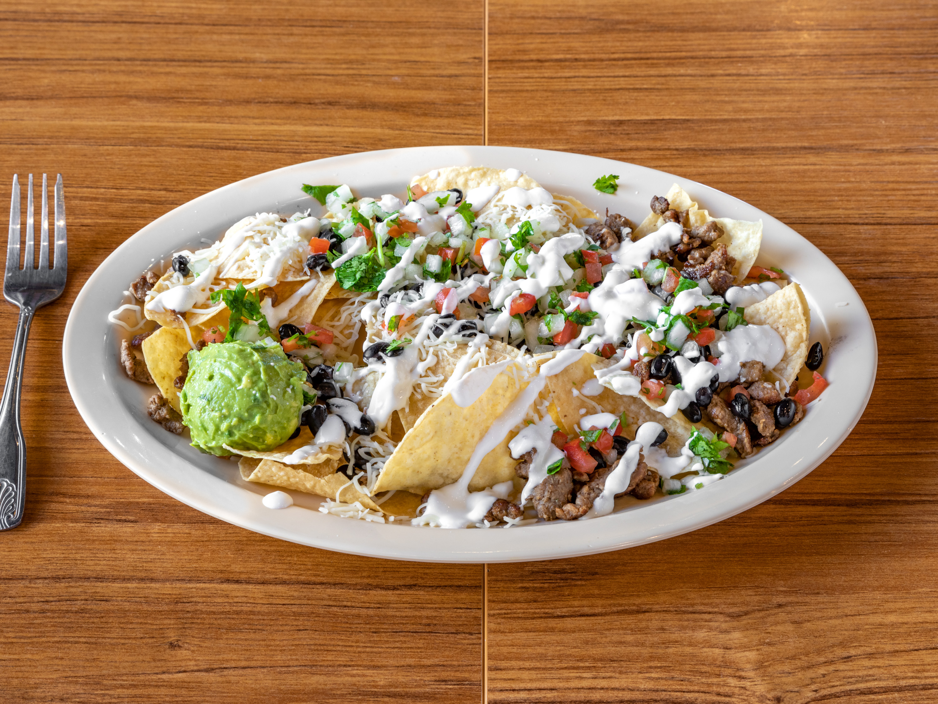 Order Loaded Nachos food online from Rudy Mexican Grill store, Mesa on bringmethat.com