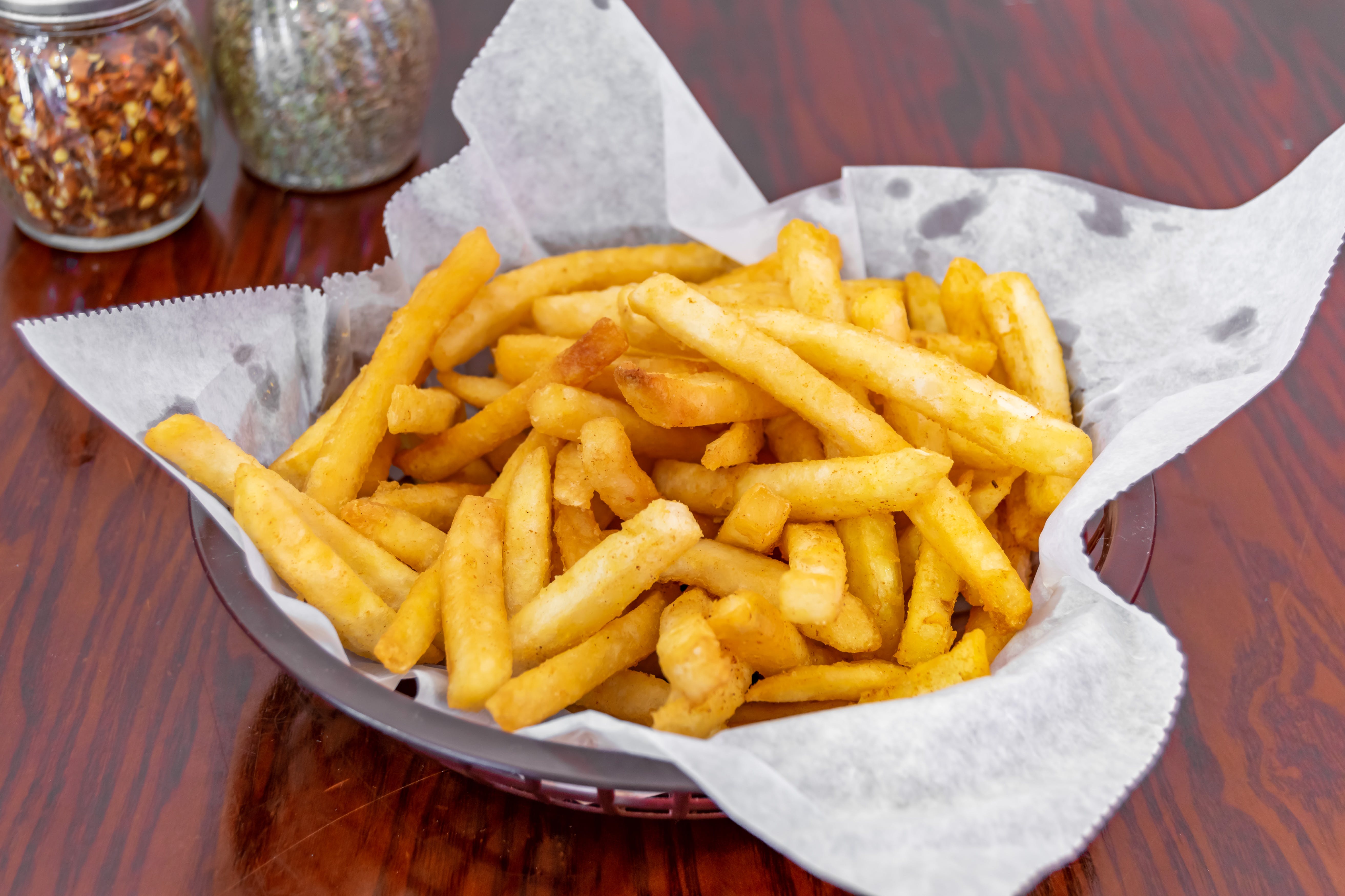 Order French Fries - Side food online from Giovannis Pizzeria store, Levittown on bringmethat.com