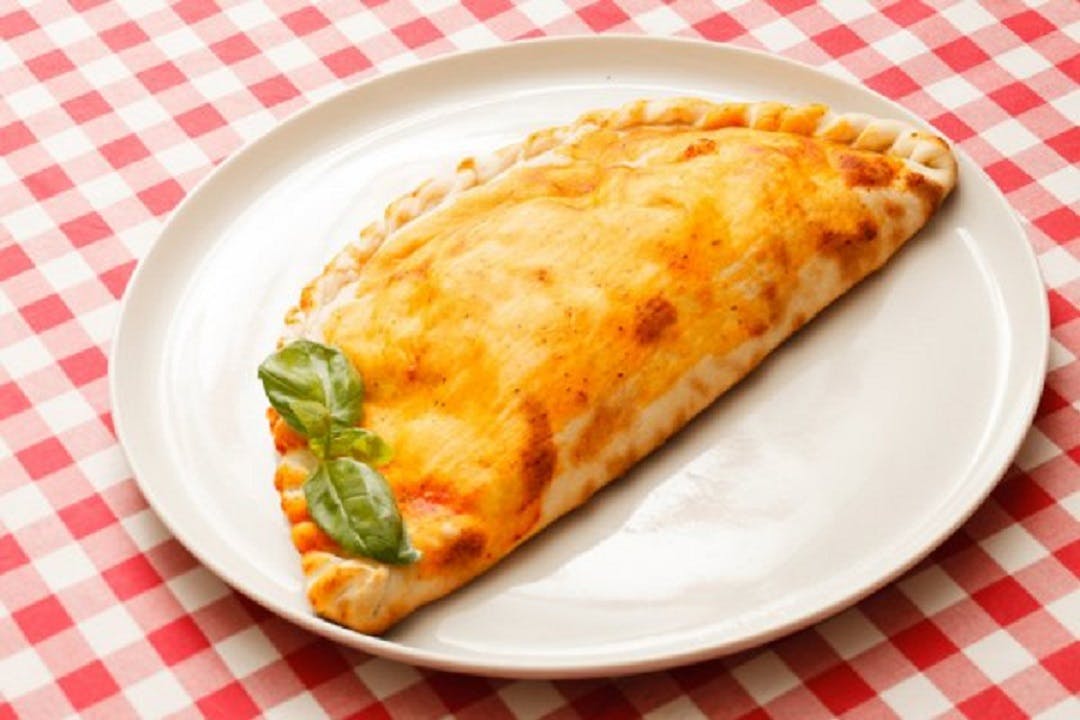 Order Spinach Calzone - Regular food online from Carmine Pizza & Pasta store, Latrobe on bringmethat.com