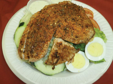 Order Jerk Fish Salad food online from Tharsy Grill store, Baltimore on bringmethat.com