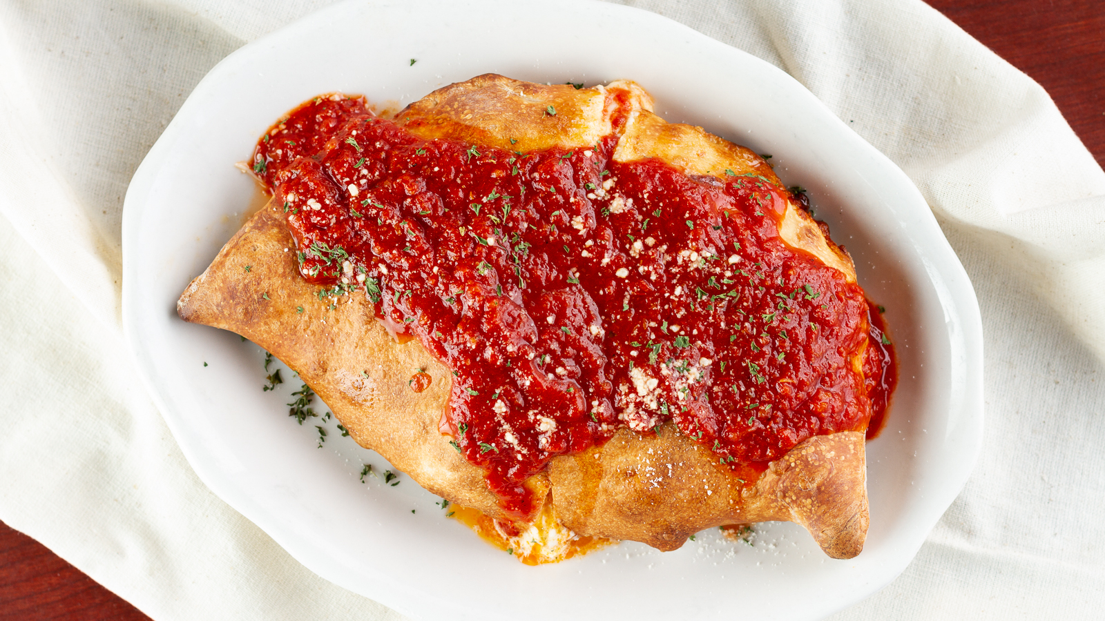 Order Calzones House Specialties food online from Three Brothers Italian Restaurant store, Waldorf on bringmethat.com