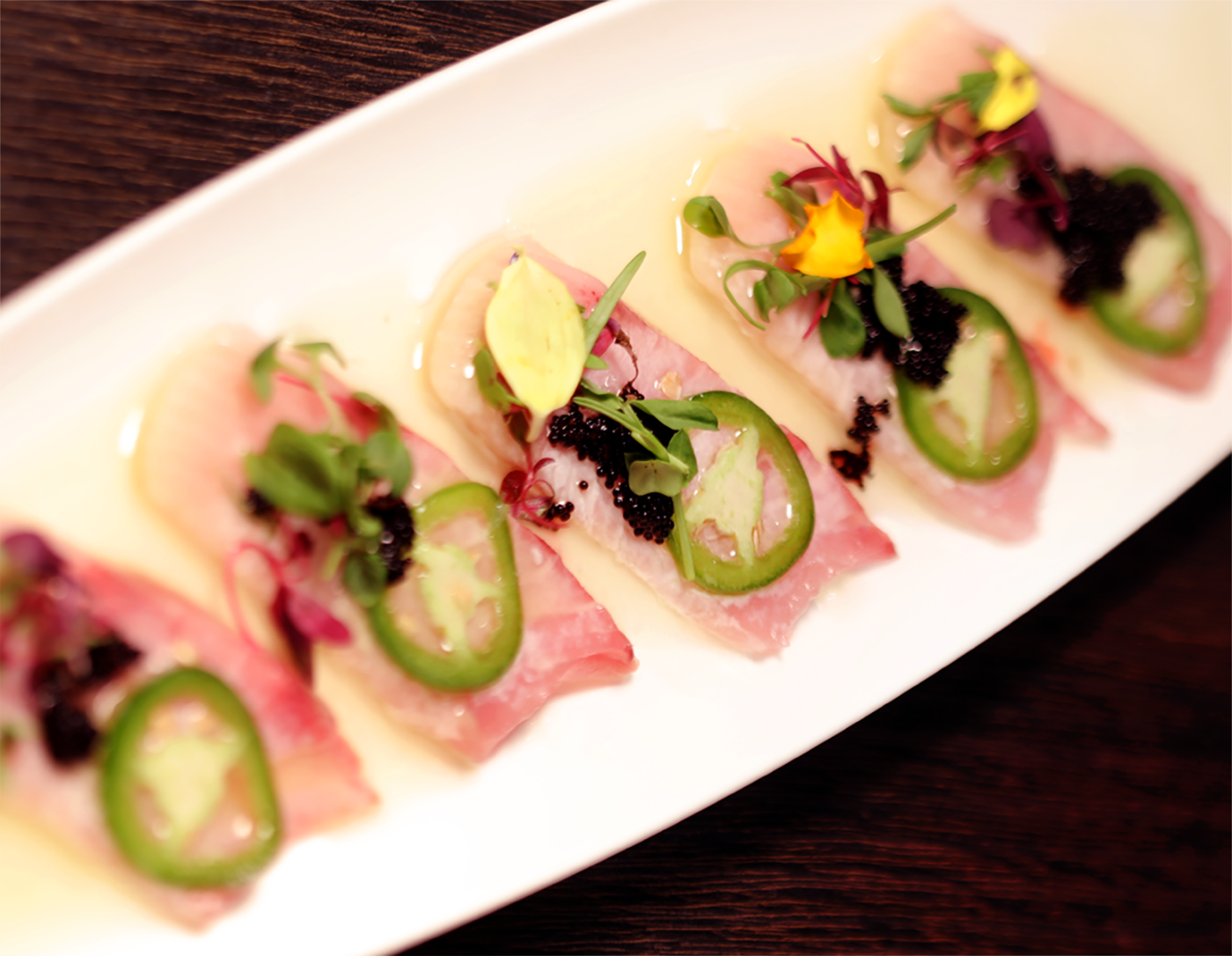 Order Truffle Yellowtail Carpaccio food online from Ise Sushi Japanese Restaurant store, Placentia on bringmethat.com
