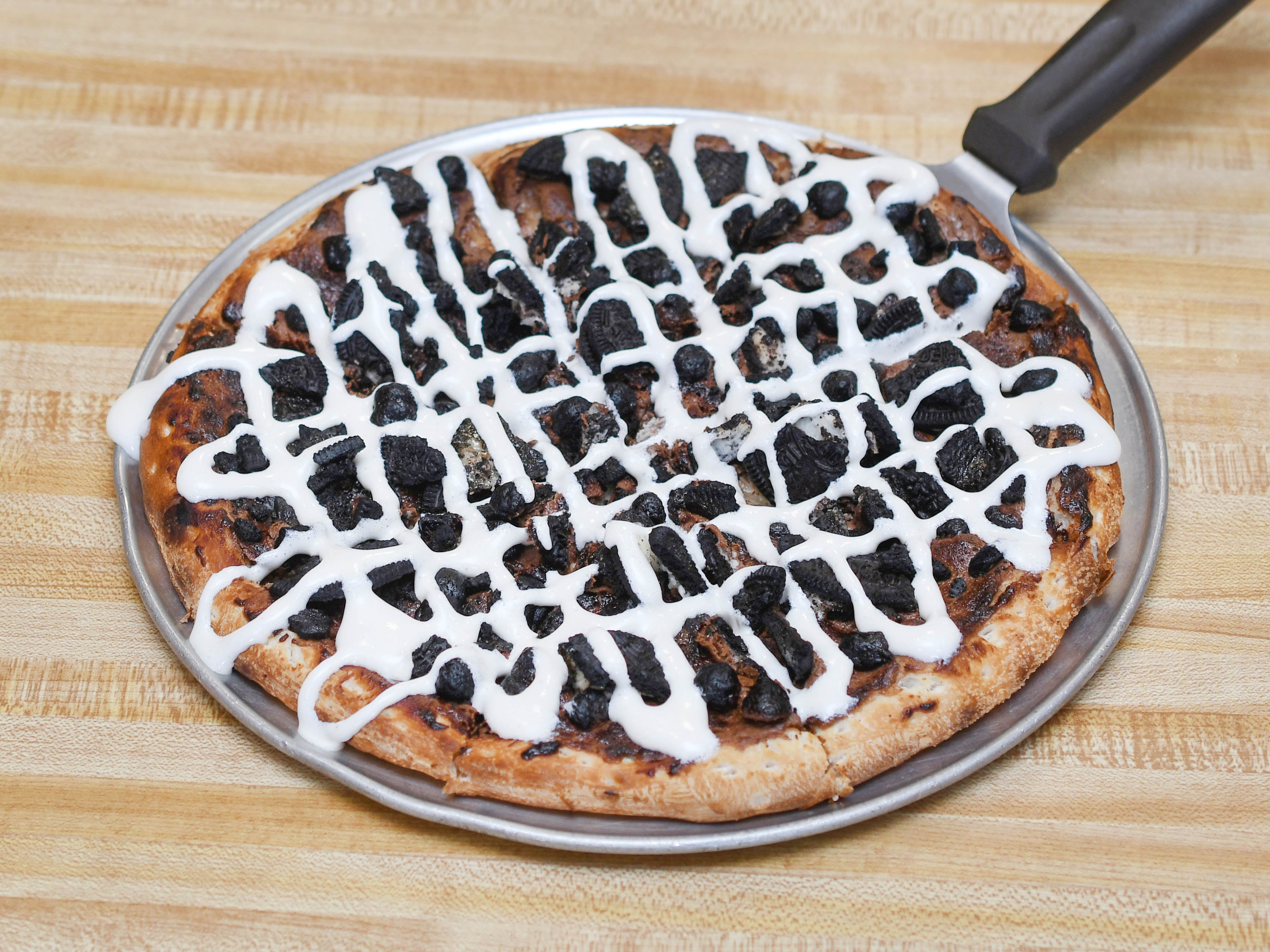 Order Nutella Oreo Dessert Pizza - 10'' food online from Happy Pizza store, Manteca on bringmethat.com
