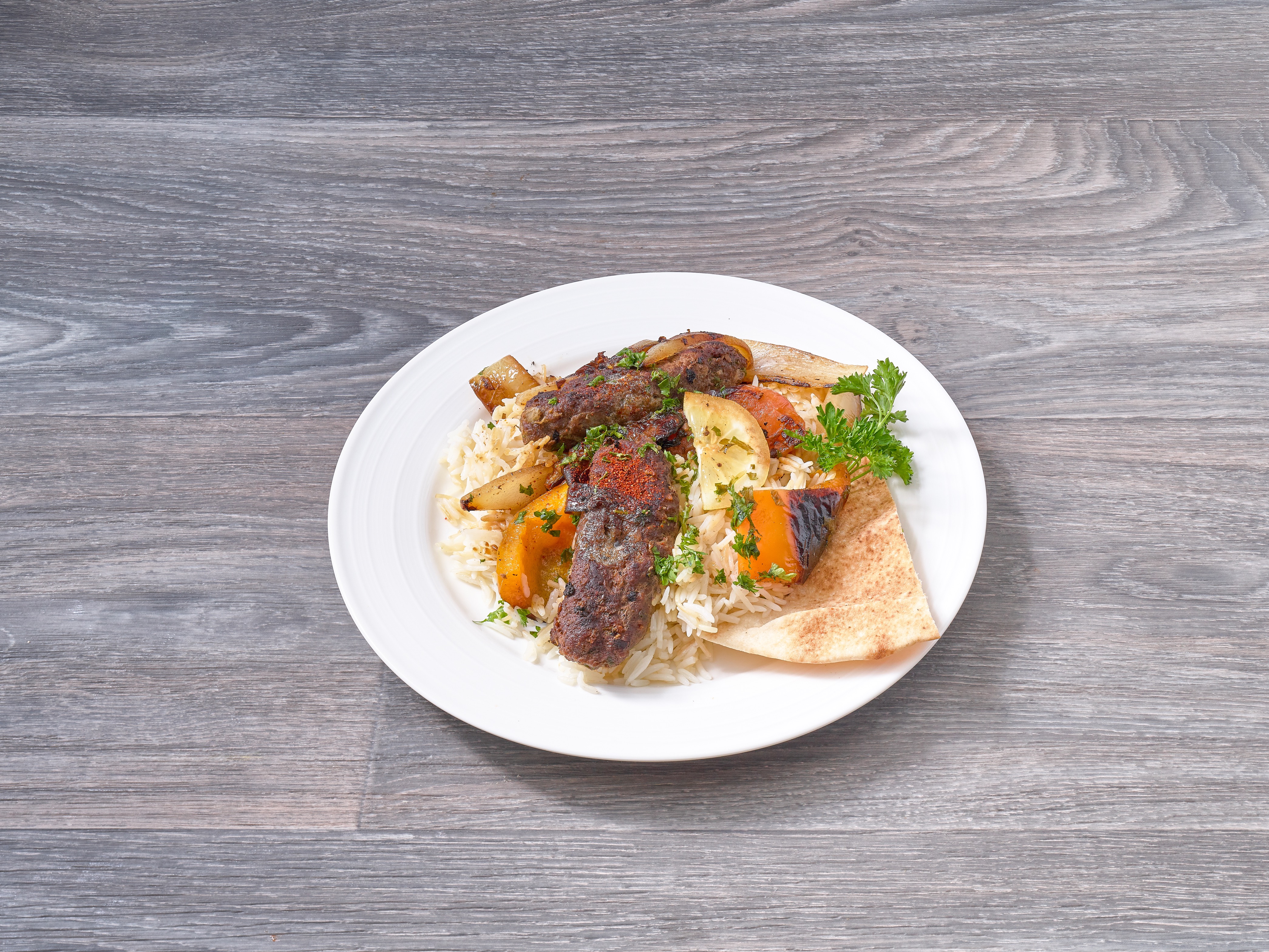 Order Kafta Kabob food online from Mona's Lebanese Cafe store, Sterling on bringmethat.com