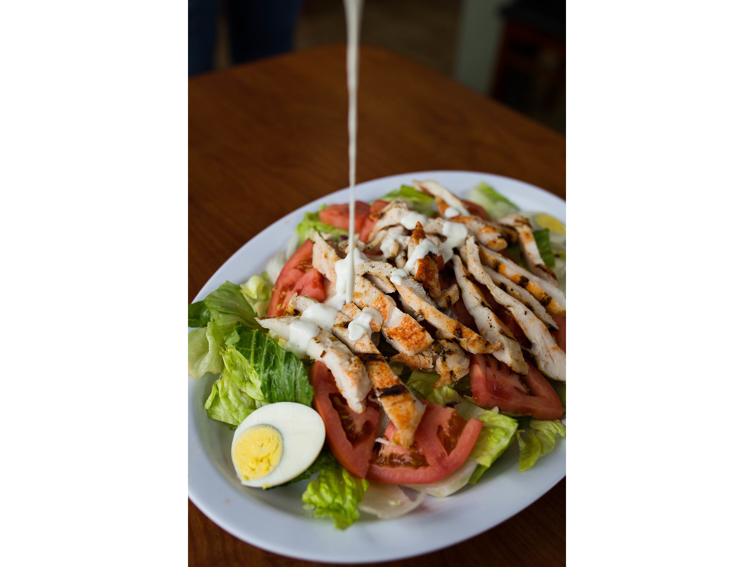 Order Charbroiled Chicken Salad food online from Norm Famous Burgers store, Whittier on bringmethat.com