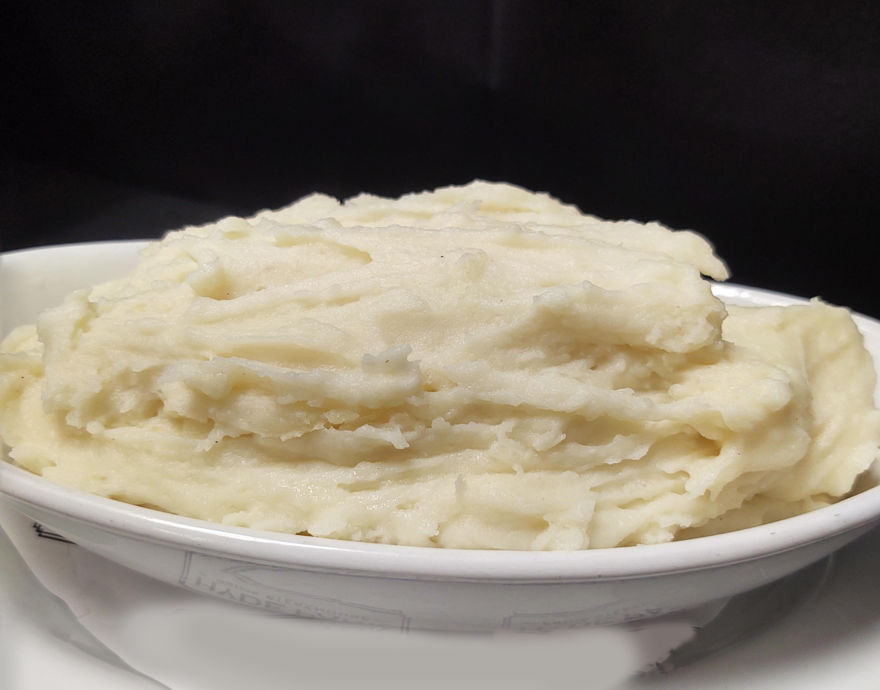 Order Roasted Garlic Whipped Potatoes food online from Hyde Park Prime Steakhouse store, Sarasota on bringmethat.com
