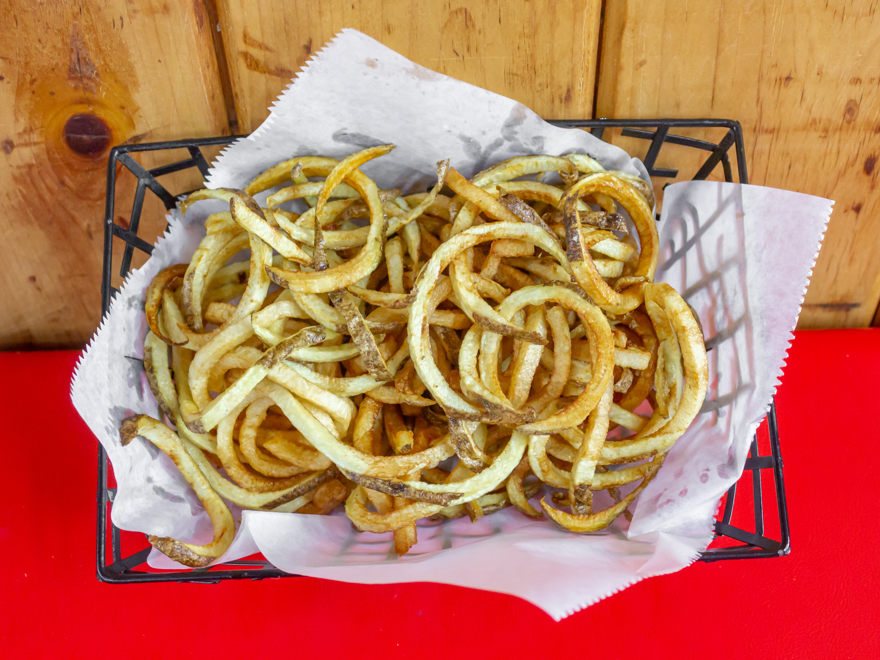 Order Curly Fries Regular food online from Sullivan's Charbroil store, Spencerport on bringmethat.com