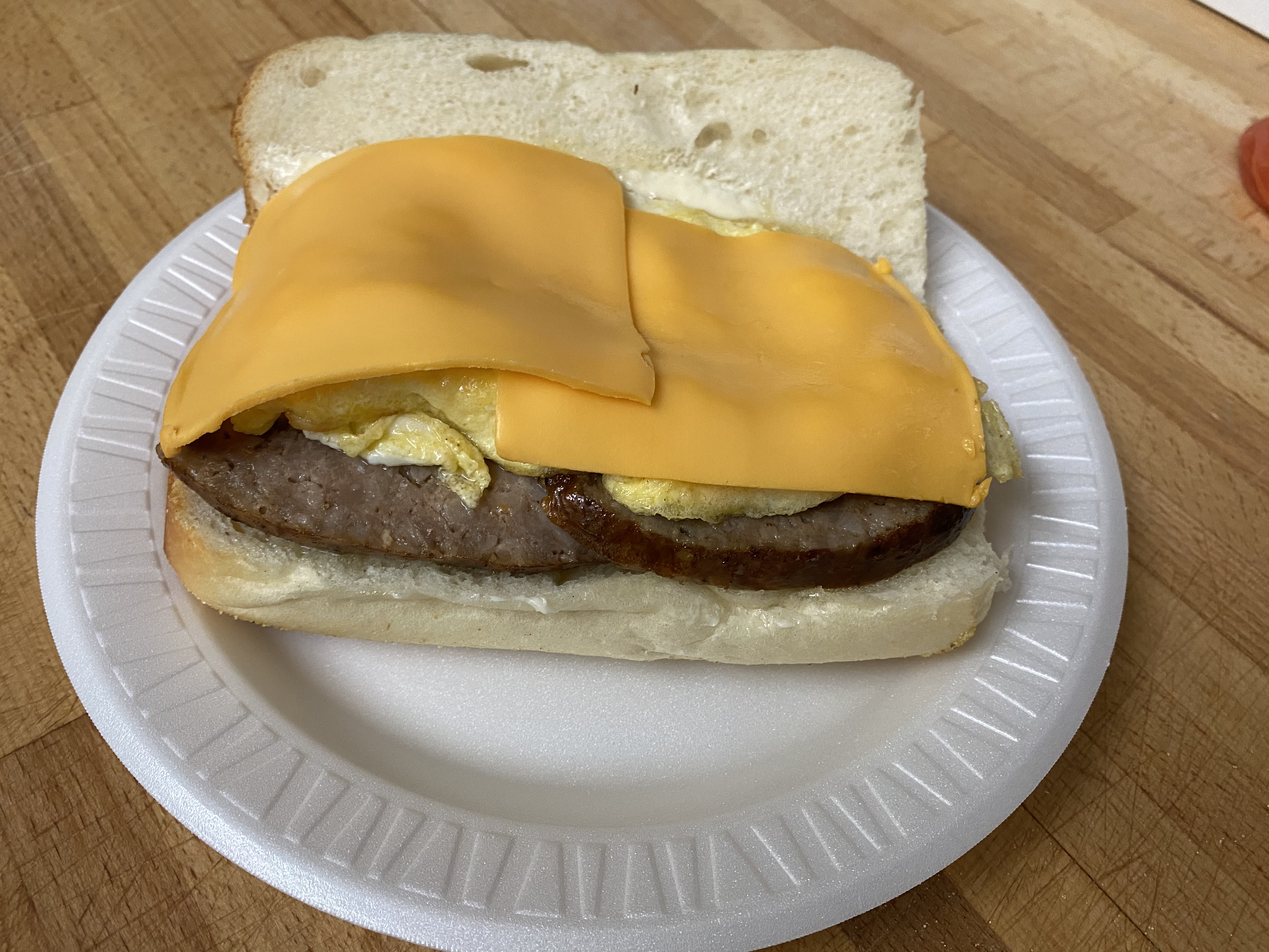 Order Sausage, Egg and Cheese Sandwich food online from Grove Deli Montclair store, Montclair on bringmethat.com