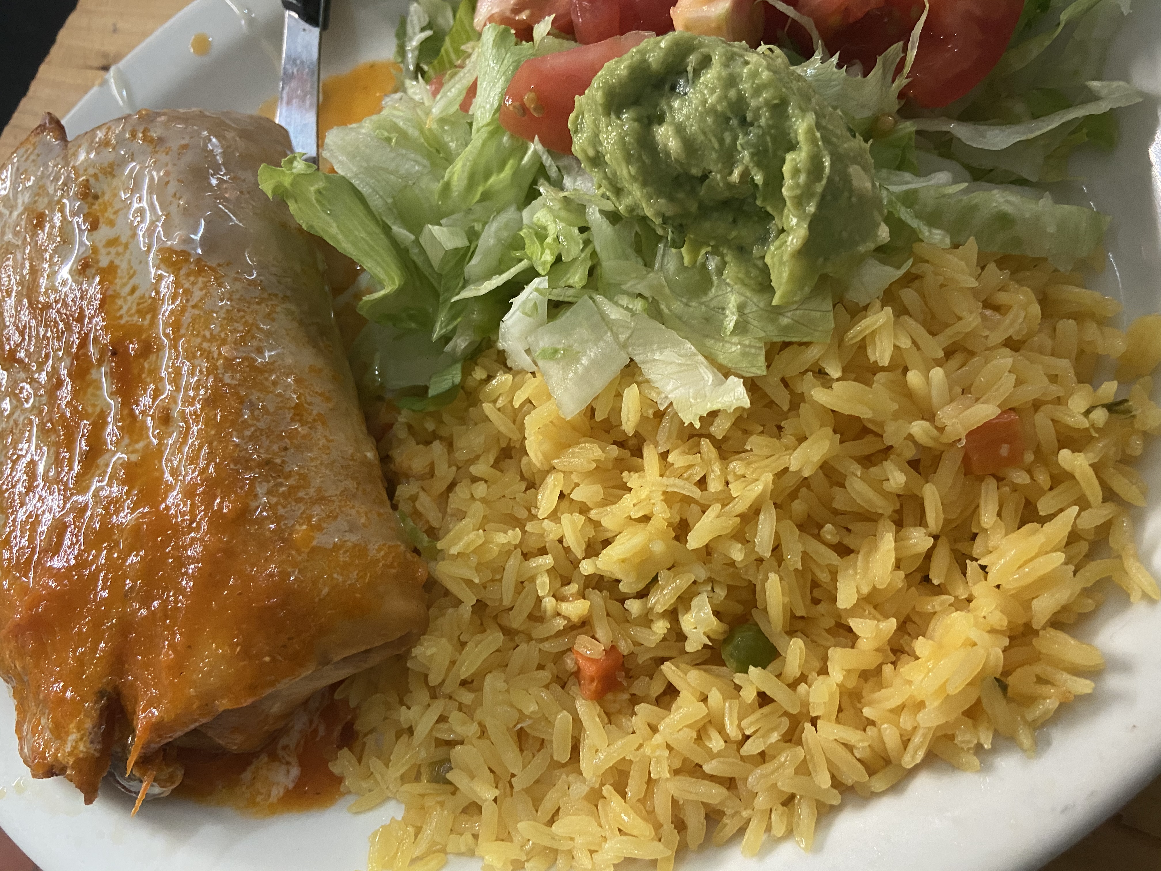 Order Jumbo Chimichanga with Mexican Rice food online from El Patron Mexican Grill & Cantina store, Albany on bringmethat.com