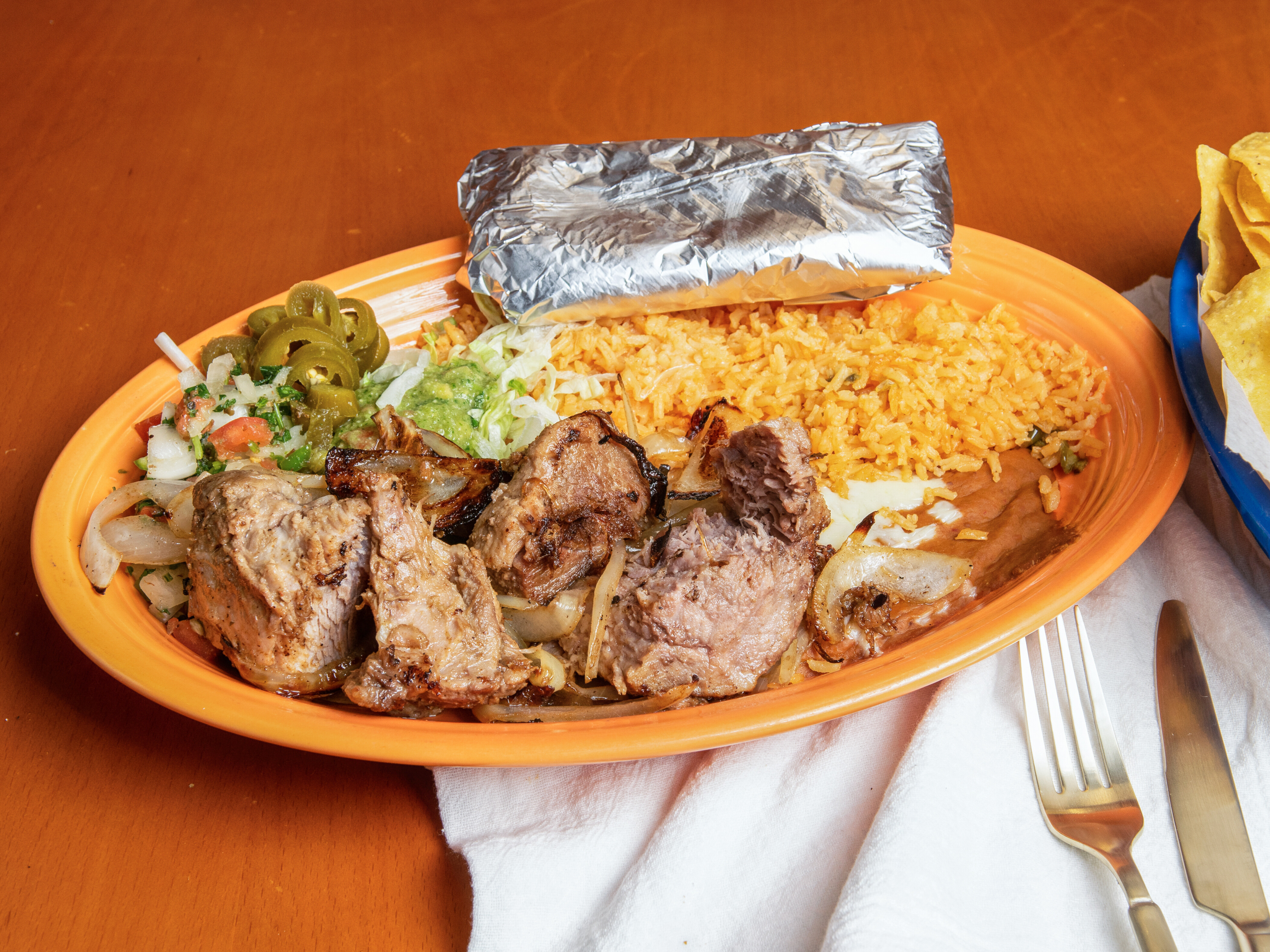 Order Carnitas Dinner food online from Los Gallos Mexican Grill store, Rochester on bringmethat.com