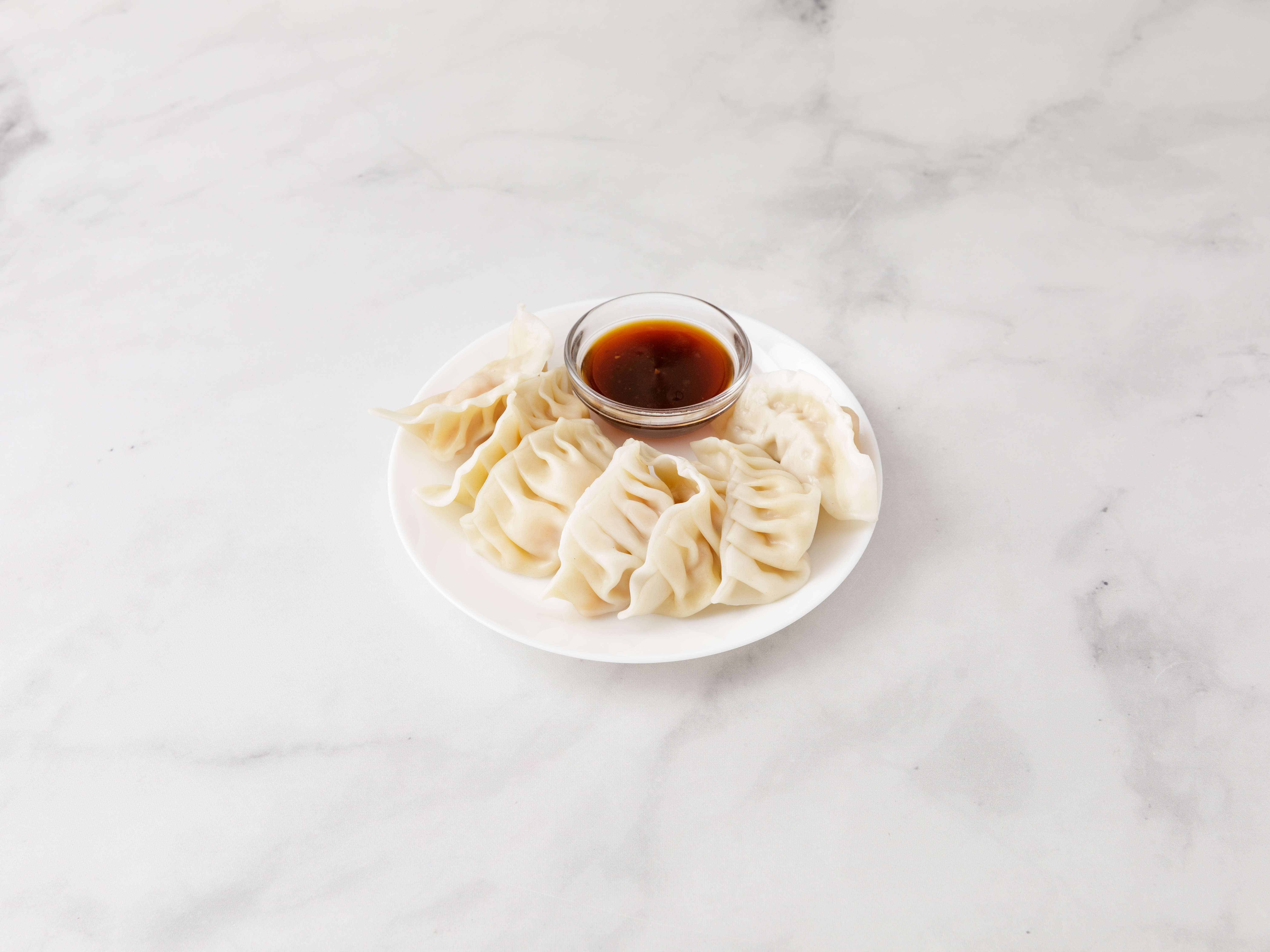Order Steamed Dumplings food online from New Great Wall Chinese Restaurant store, Mount Kisco on bringmethat.com