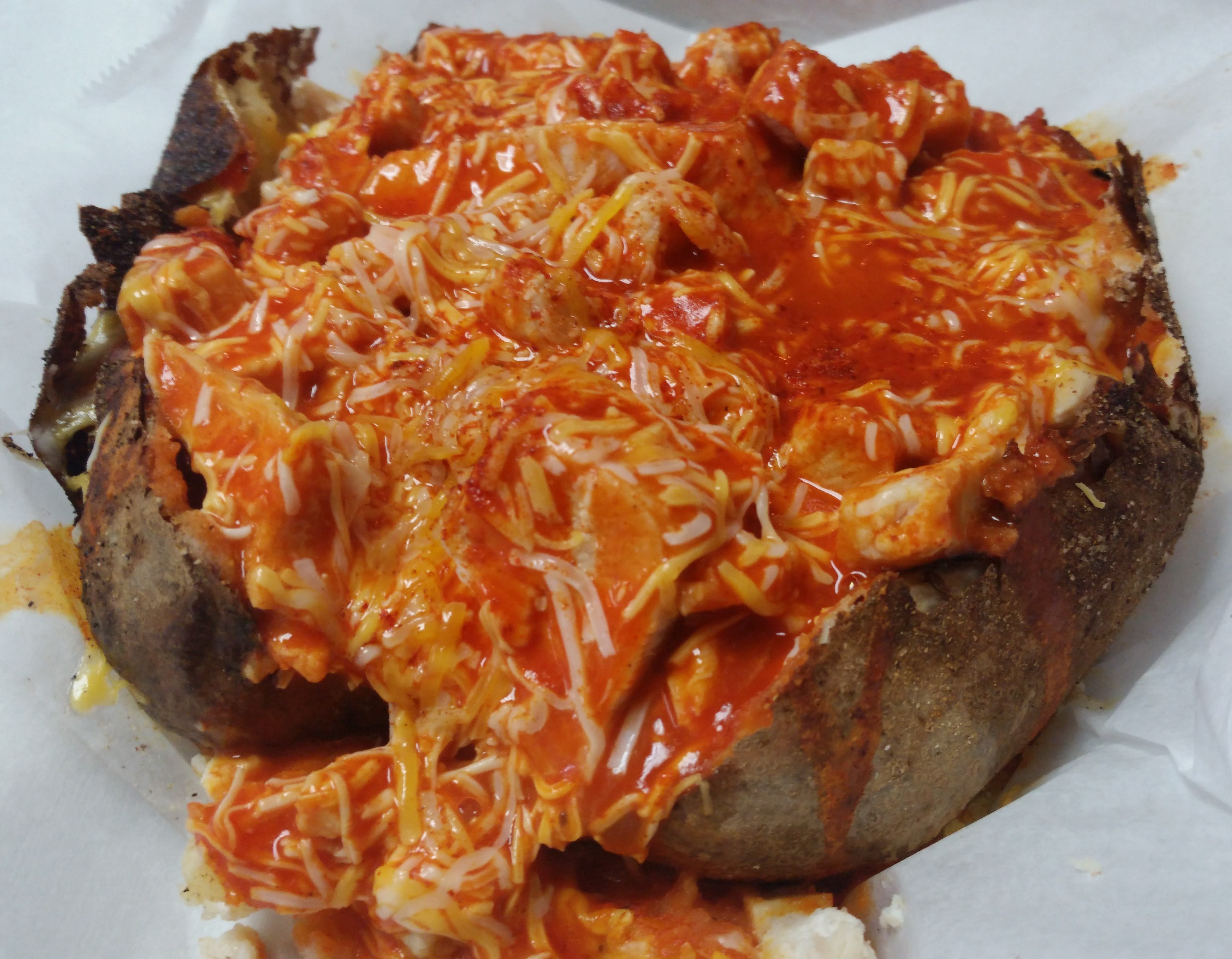 Order 13. Buffalo Chicken Baked Potato food online from Georgia Potato Factory store, Griffin on bringmethat.com
