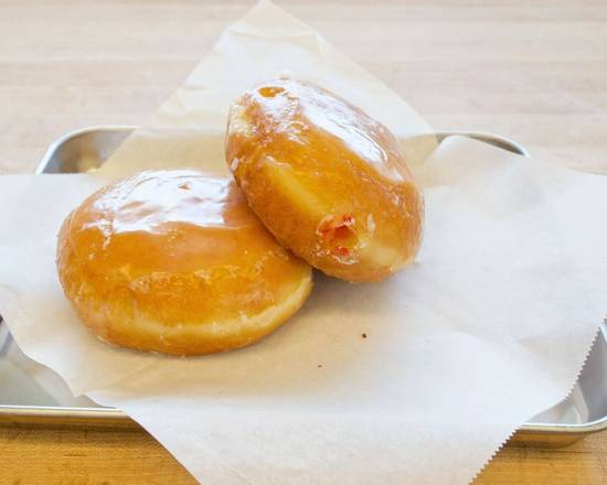 Order Glazed Round Filled with Raspberry Jelly food online from Wake & Bake store, Denver on bringmethat.com
