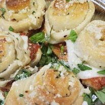 Order Garlic Knots - 6 Pieces food online from Crespos Express store, Jackson Township on bringmethat.com