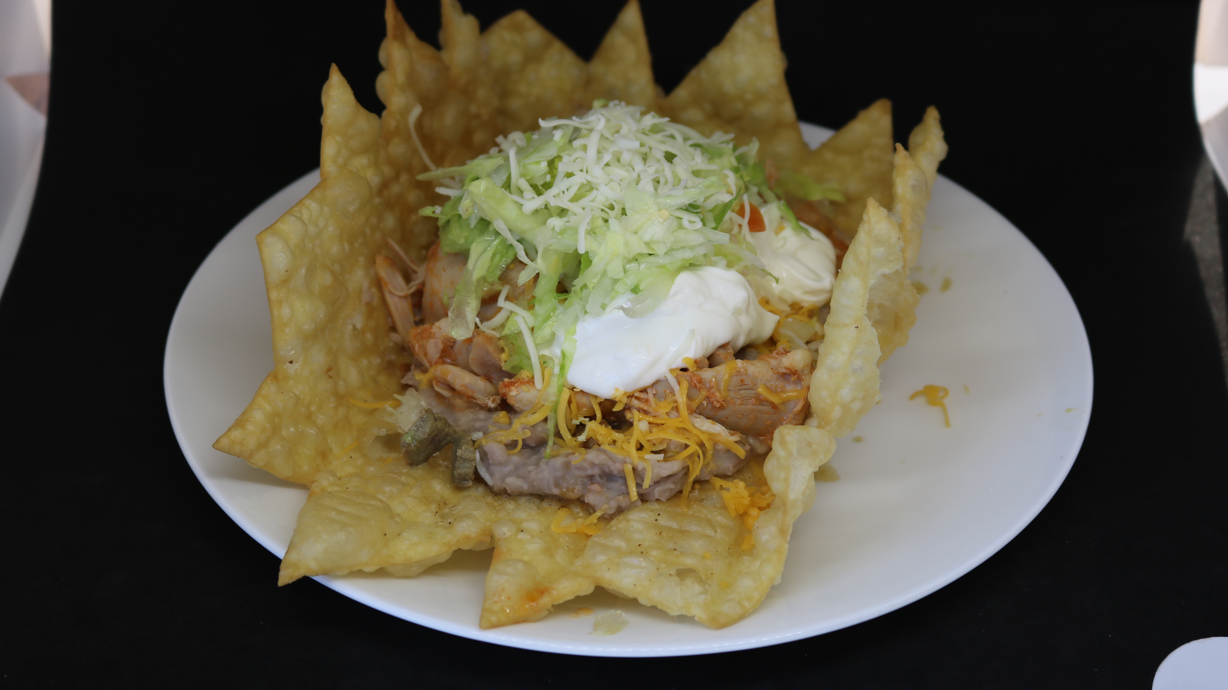 Order Flying Saucer Tostada food online from Albertaco's Mexican Food Inc store, Cypress on bringmethat.com