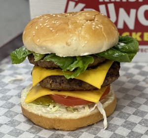 Order Hunger Buster Burger food online from Krispy Krunchy Chicken store, Irving on bringmethat.com