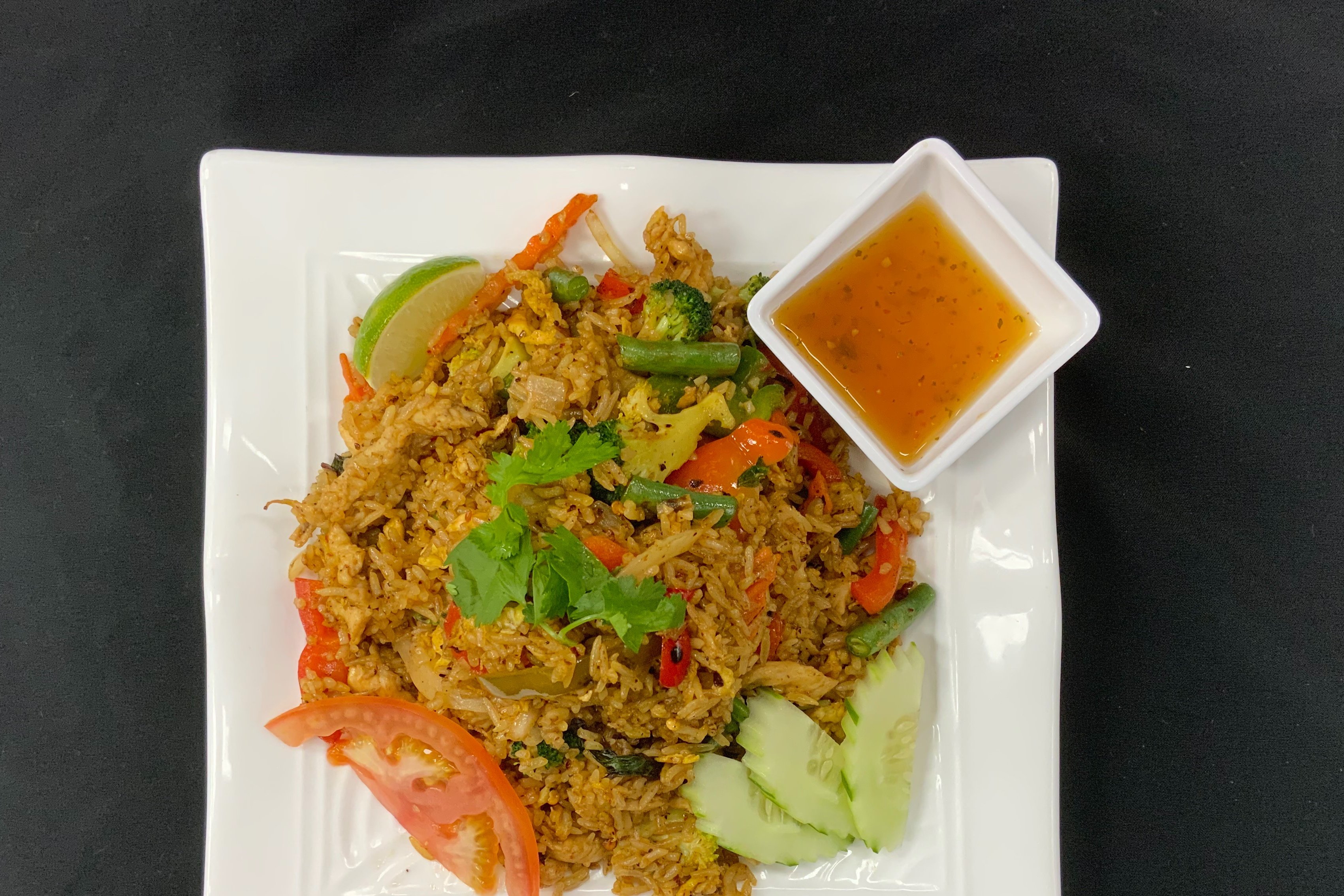 Order Basil fried rice  food online from Rai Lay Thai Cuisine store, Charlotte on bringmethat.com