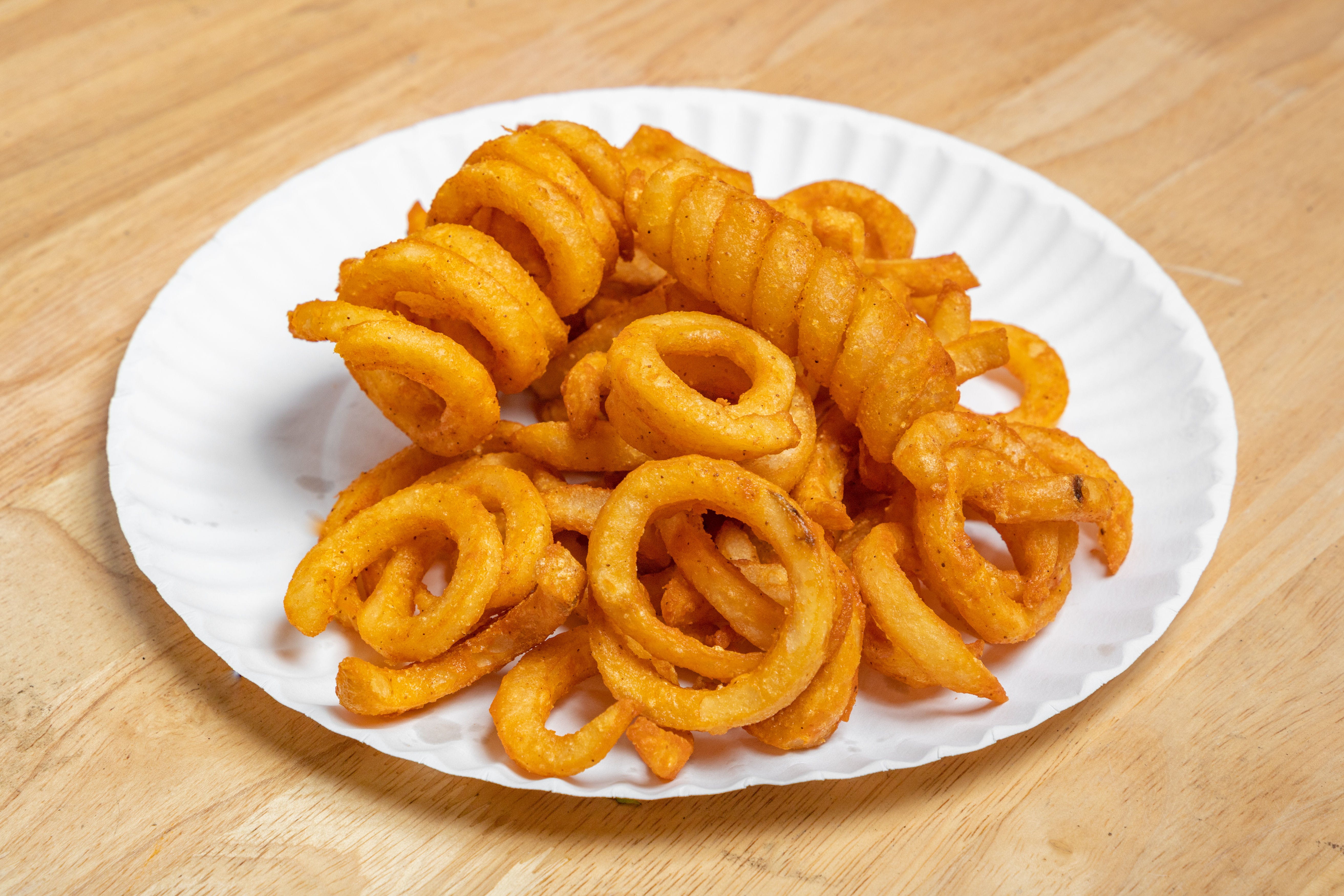 Order Curly Seasoned Fries - Side food online from Express Pizza store, Bedford on bringmethat.com