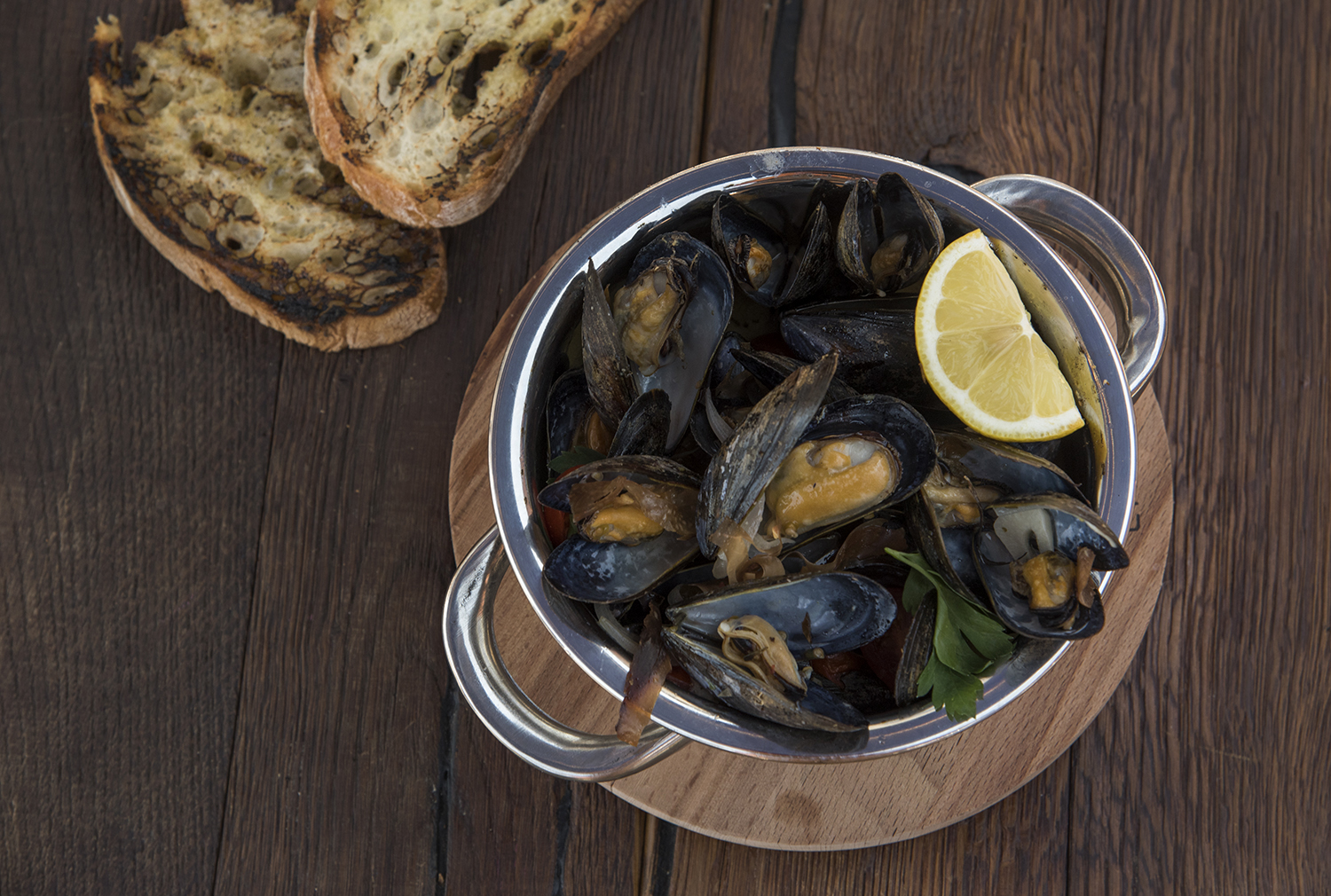 Order P.E.I. Mussels food online from Ivy City Smokehouse store, Washington on bringmethat.com