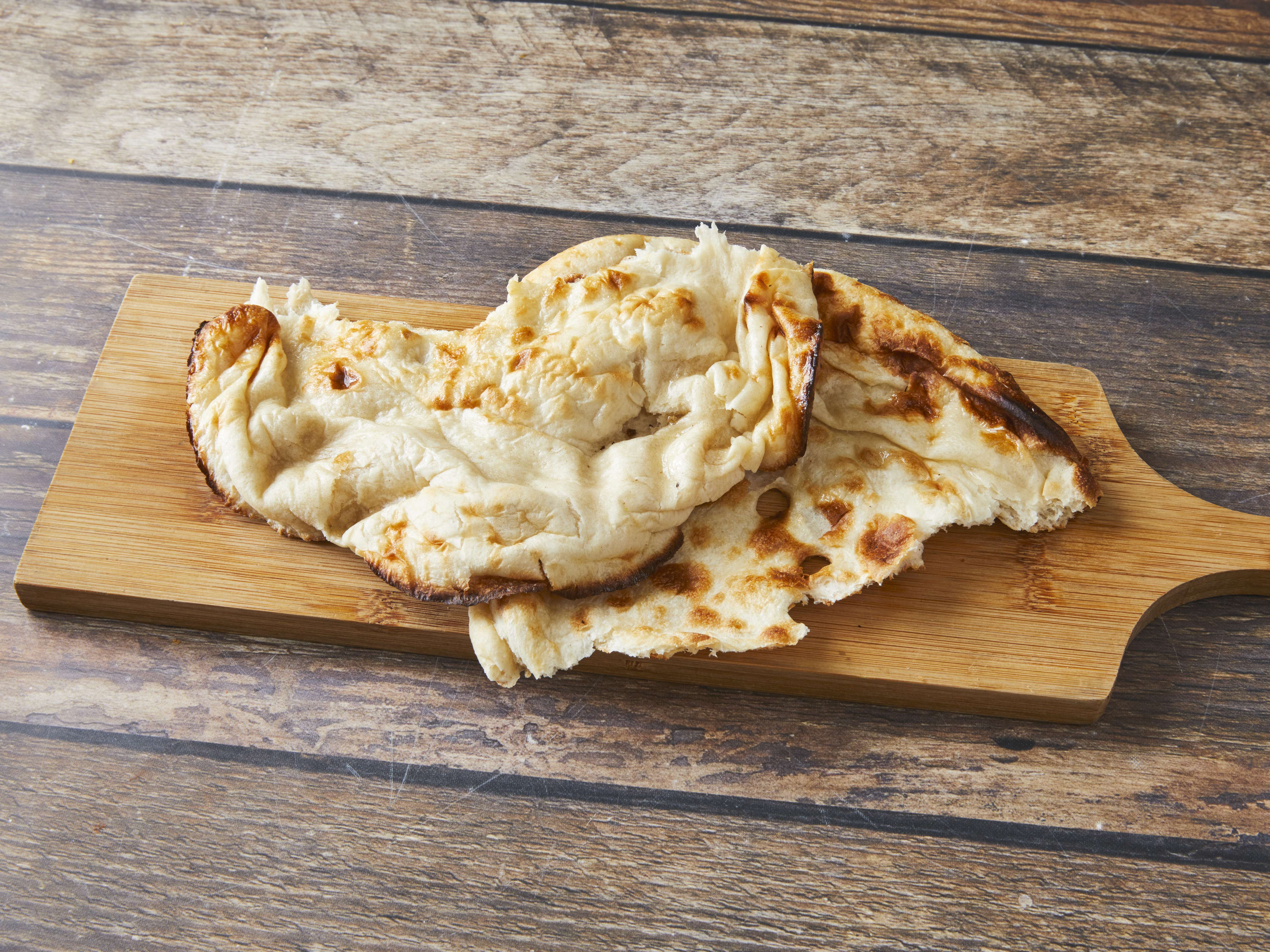 Order Naan food online from Tiffin store, CHICAGO on bringmethat.com