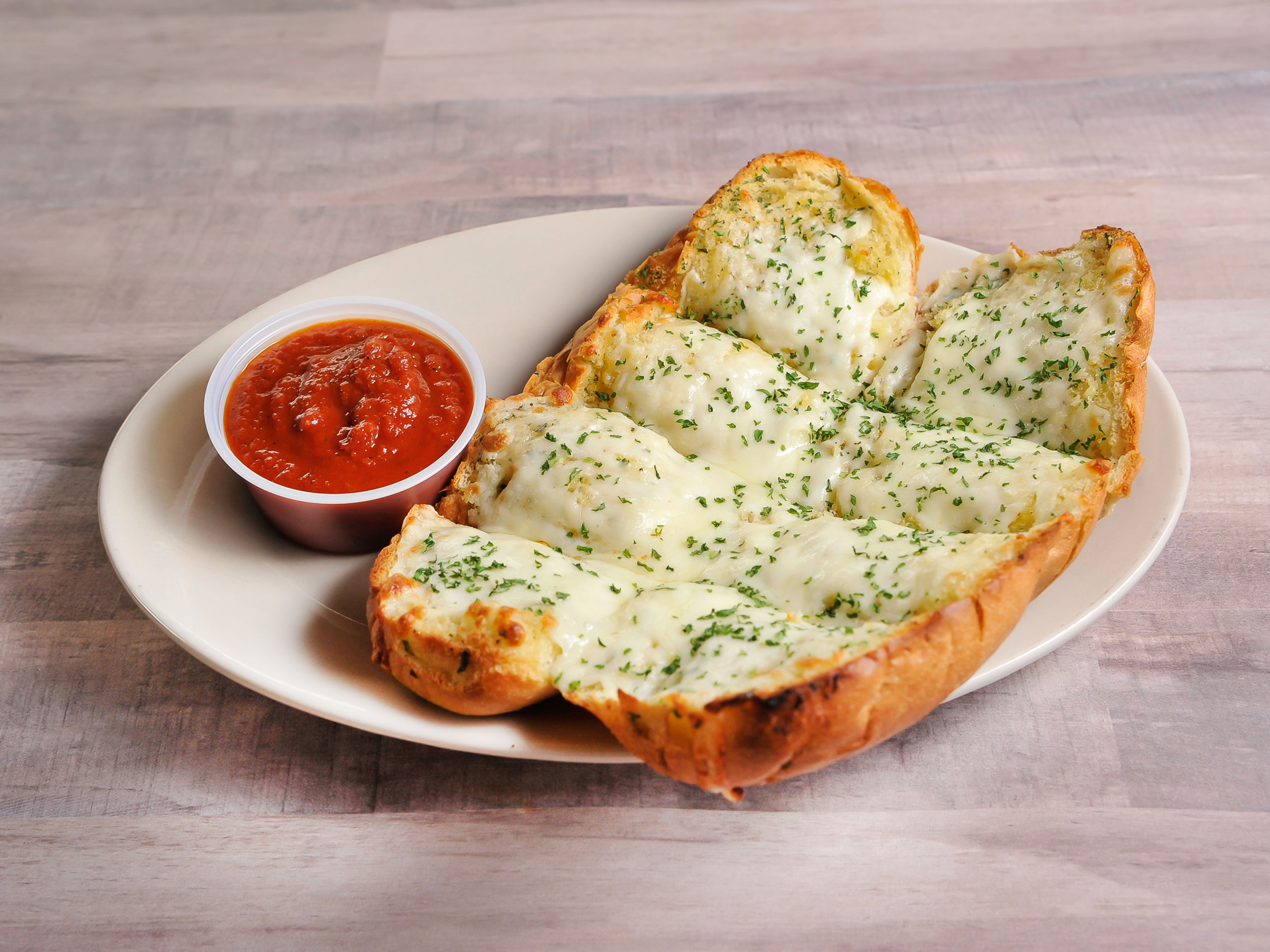 Order CHEESY GARLIC BREAD food online from Pisano Pizzeria store, Kennesaw on bringmethat.com