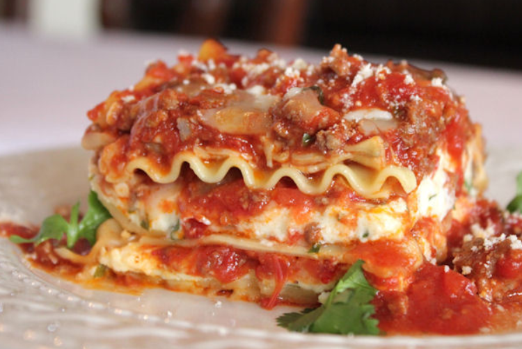 Order Side of Beef Lasagna food online from Pizza Azteca store, Dallas on bringmethat.com