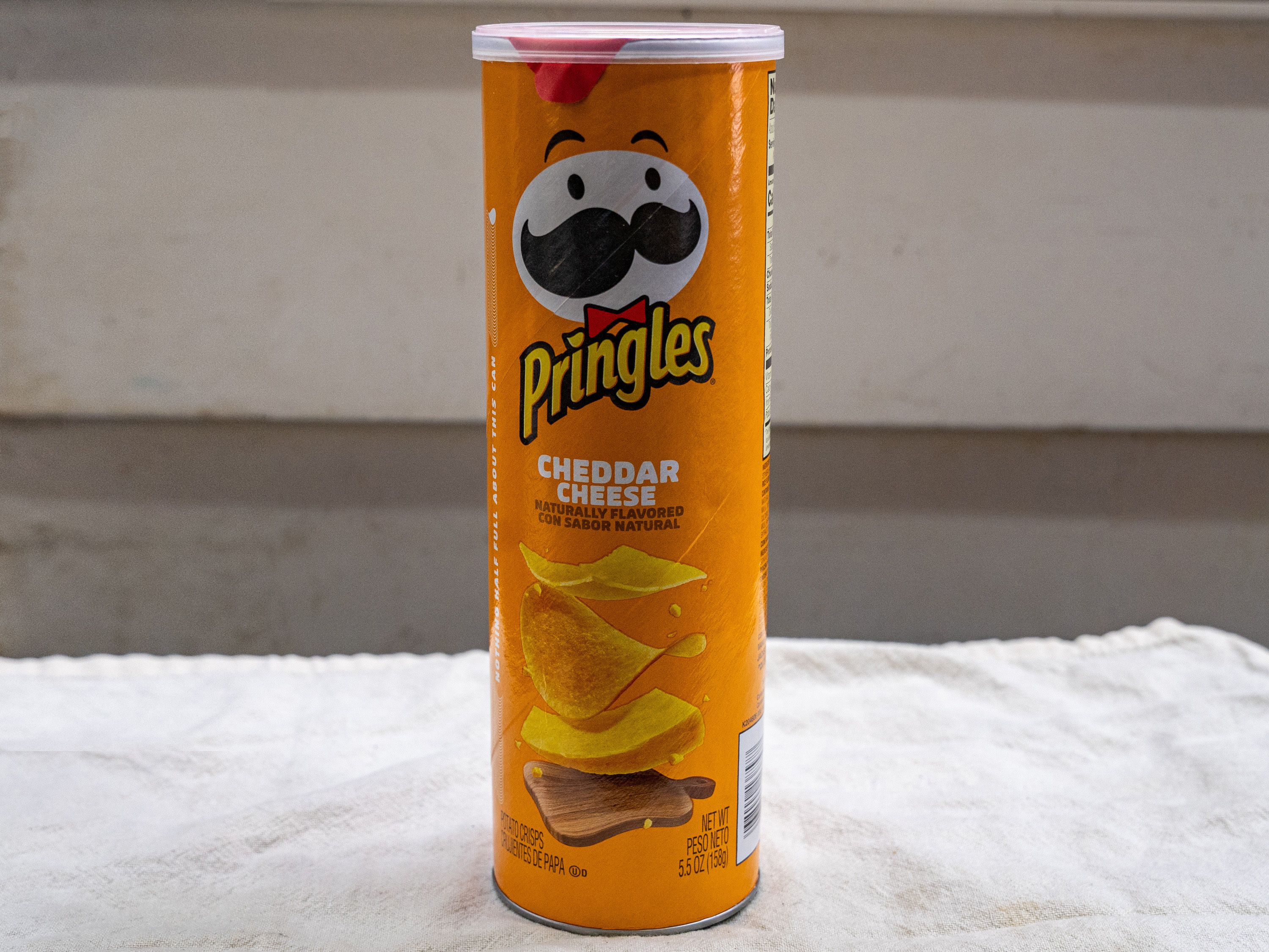 Order Pringles Cheddar cheese -5.2oz food online from Quentin Deli and Grocery store, Brooklyn on bringmethat.com