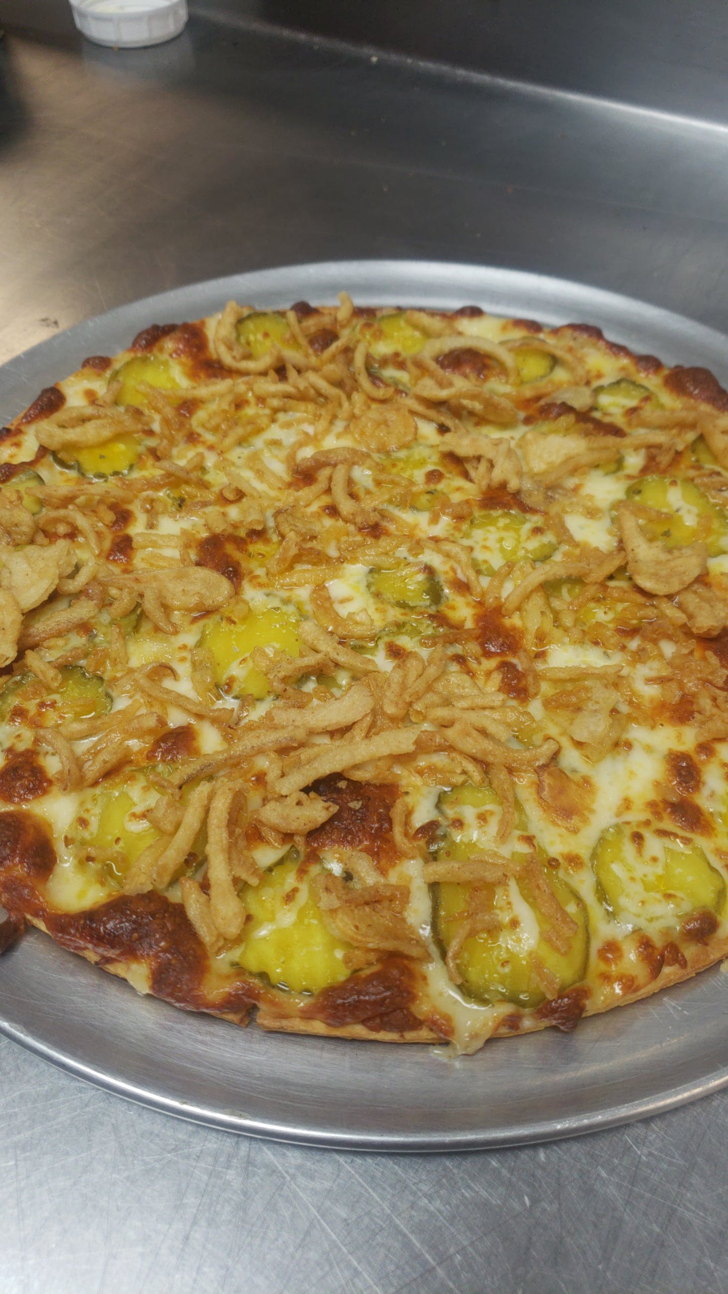 Order Fried Pickle Pizza - 10" food online from Saucy's Pizzeria store, Hillsboro on bringmethat.com