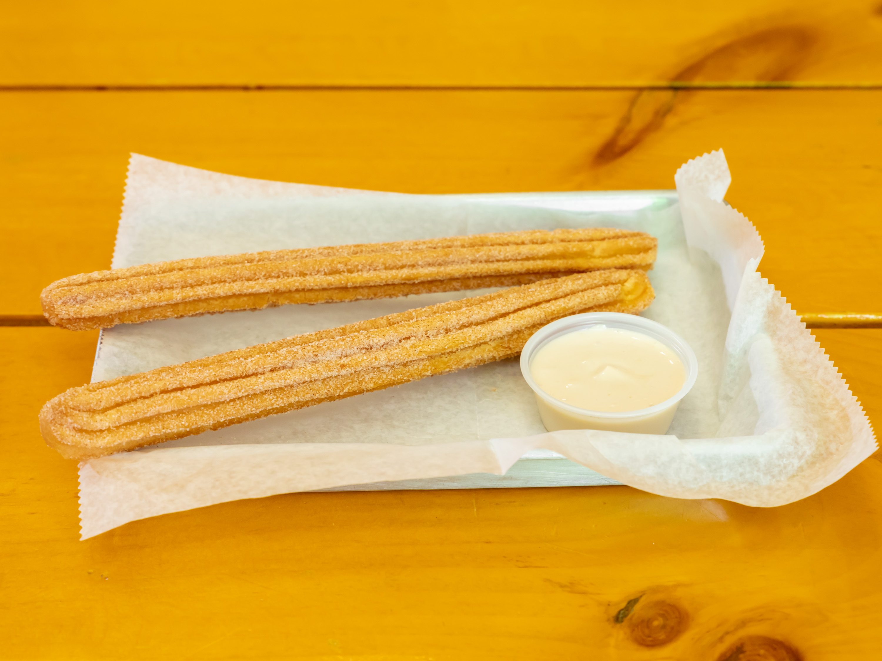 Order Churros food online from Burgers & Burritos store, Southbury on bringmethat.com