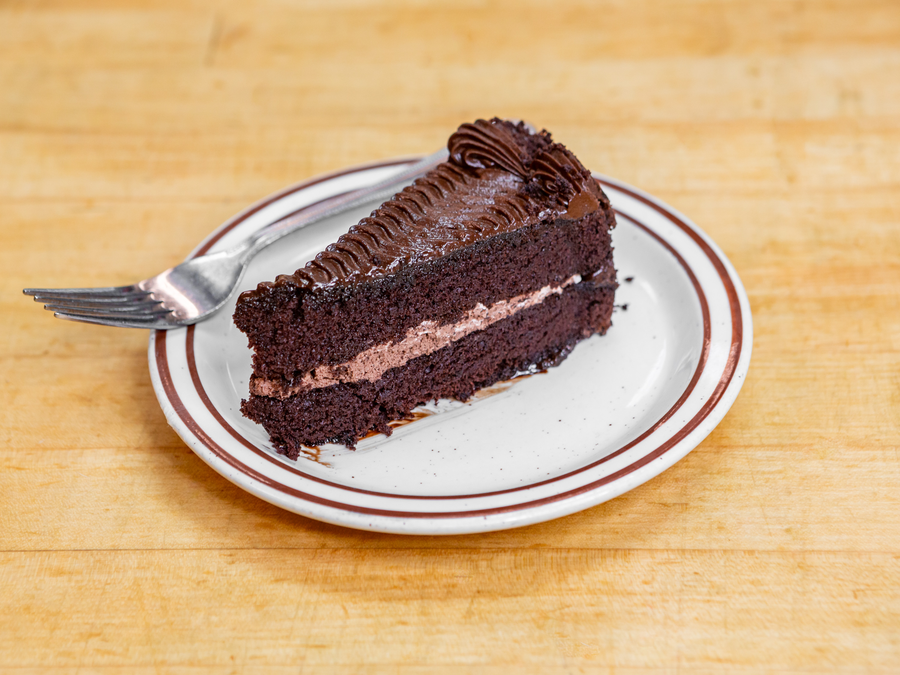 Order Chocolate Cake food online from Guidos Pizza store, Anchorage on bringmethat.com