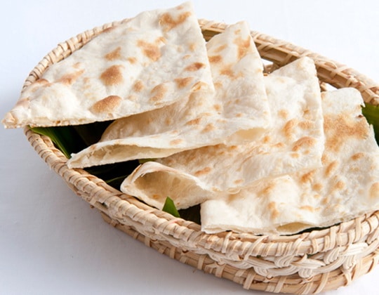 Order Plain Naan food online from Spice 9 store, Columbus on bringmethat.com