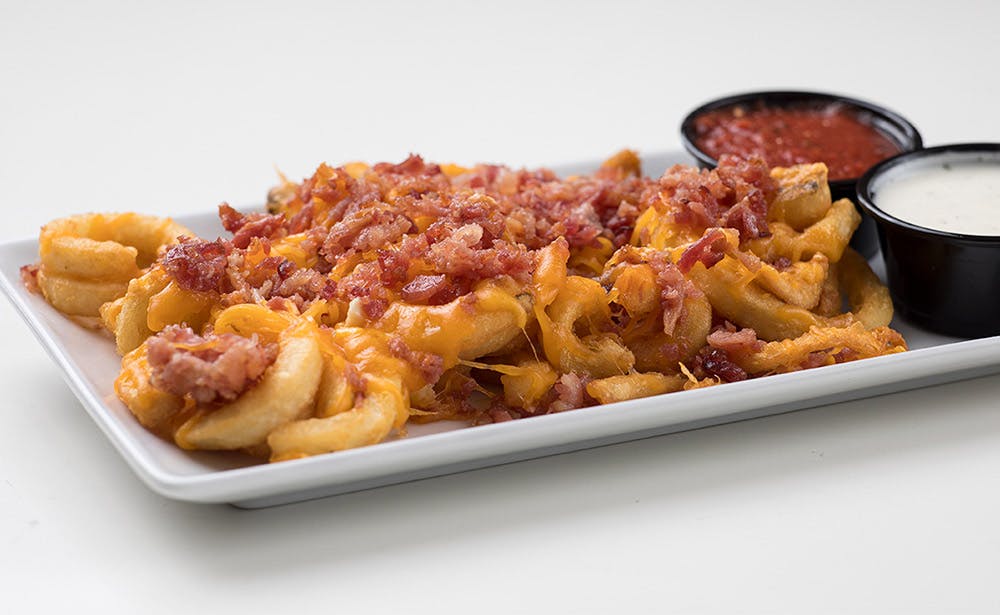 Order Bacon Fries - Small food online from Calz Pizza store, Norfolk on bringmethat.com