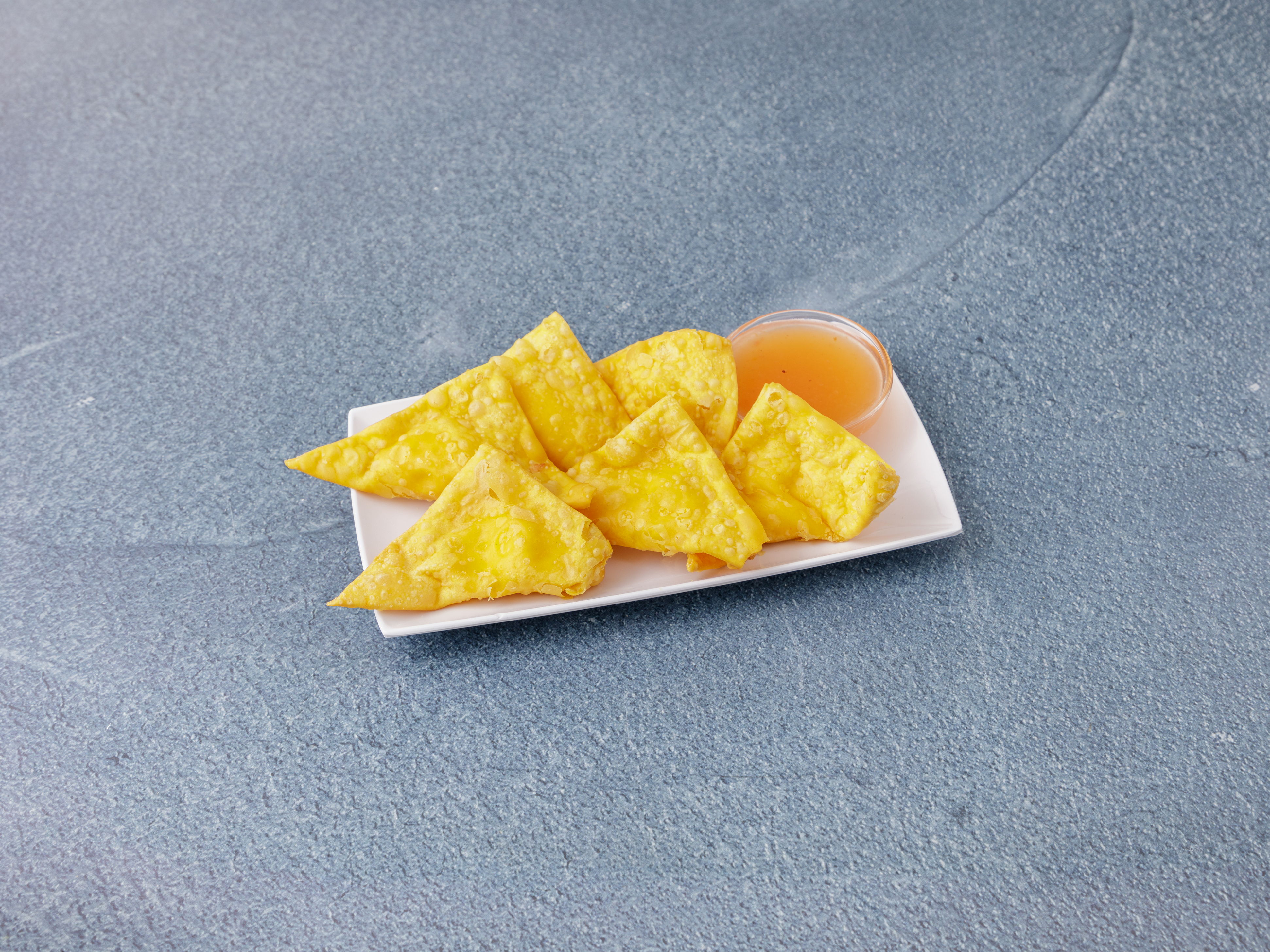 Order 6 Pieces Crab Rangoon food online from Jacky's Galaxie Restaurant store, Providence on bringmethat.com