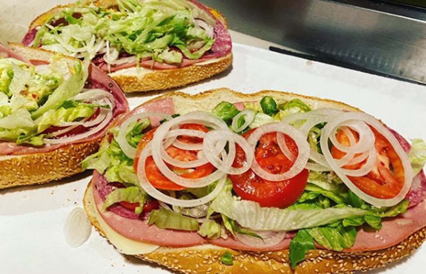 Order Torpedo Sandwich - Sandwich food online from De Luca's Pizza store, San Diego on bringmethat.com