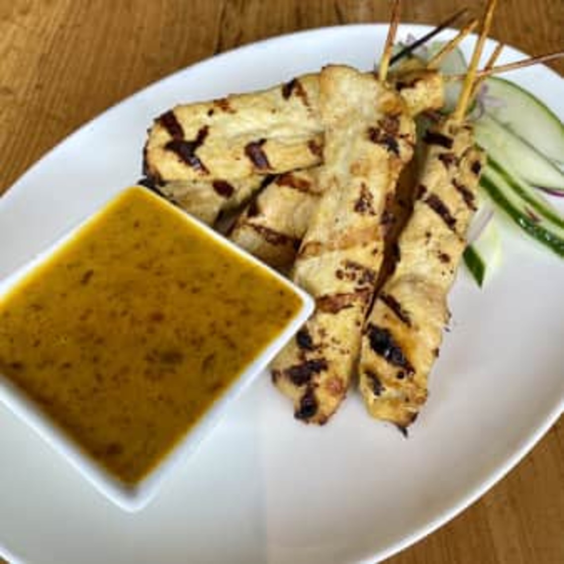 Order Grilled Indochine Chicken Satay Skewers food online from China Live store, San Francisco on bringmethat.com