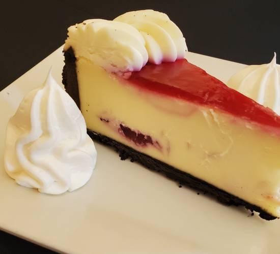 Order White Chocolate Raspberry Cheesecake food online from One World Cafe store, PEORIA on bringmethat.com