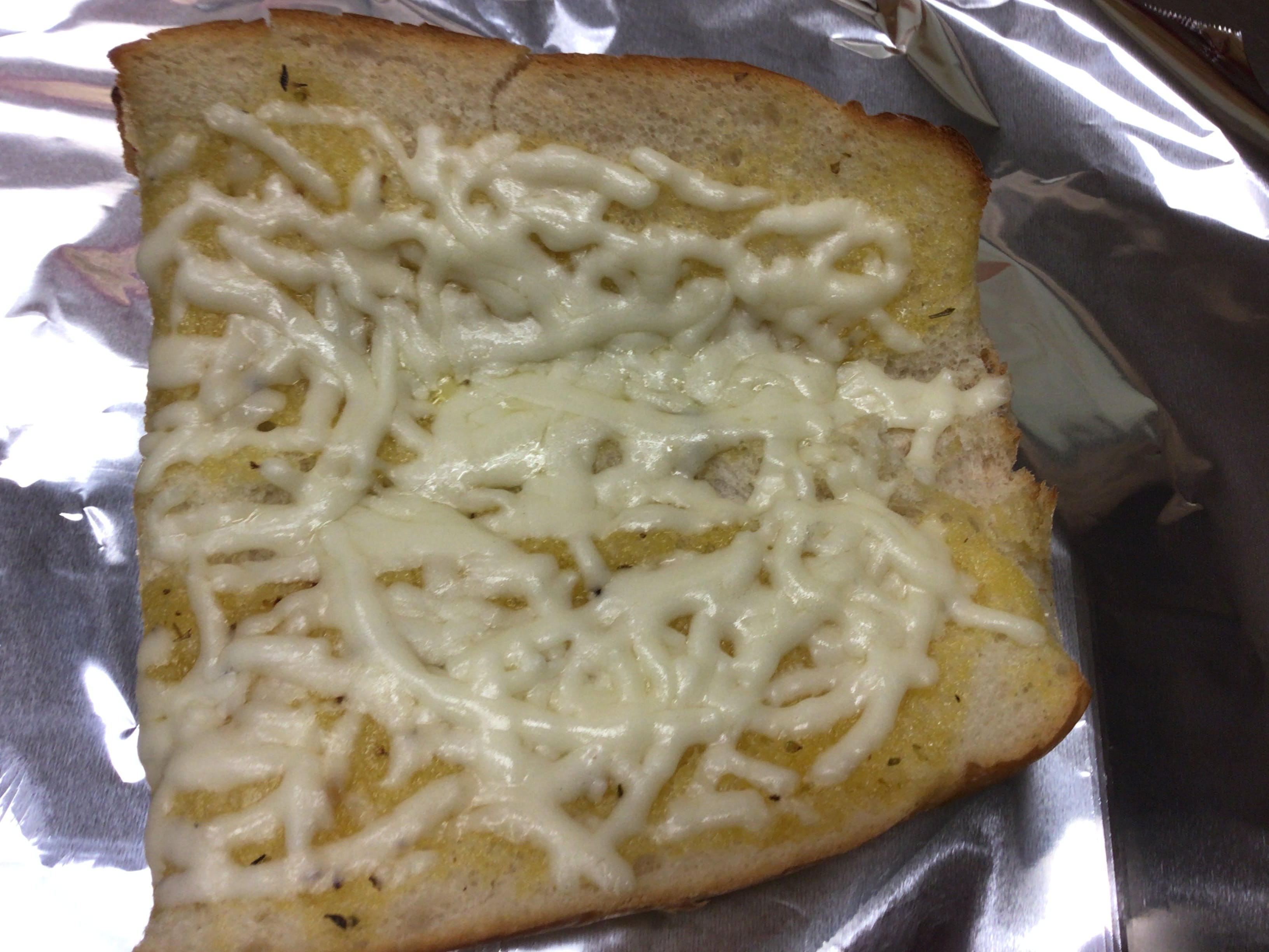 Order Garlic Bread with Cheese - Appetizers food online from Porto Fino Pizza store, Columbus on bringmethat.com
