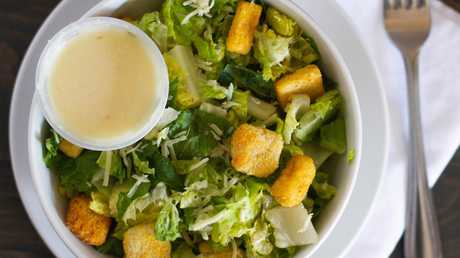 Order Classic Caesar Salad food online from BreWingZ Restaurant & Bar store, Houston on bringmethat.com