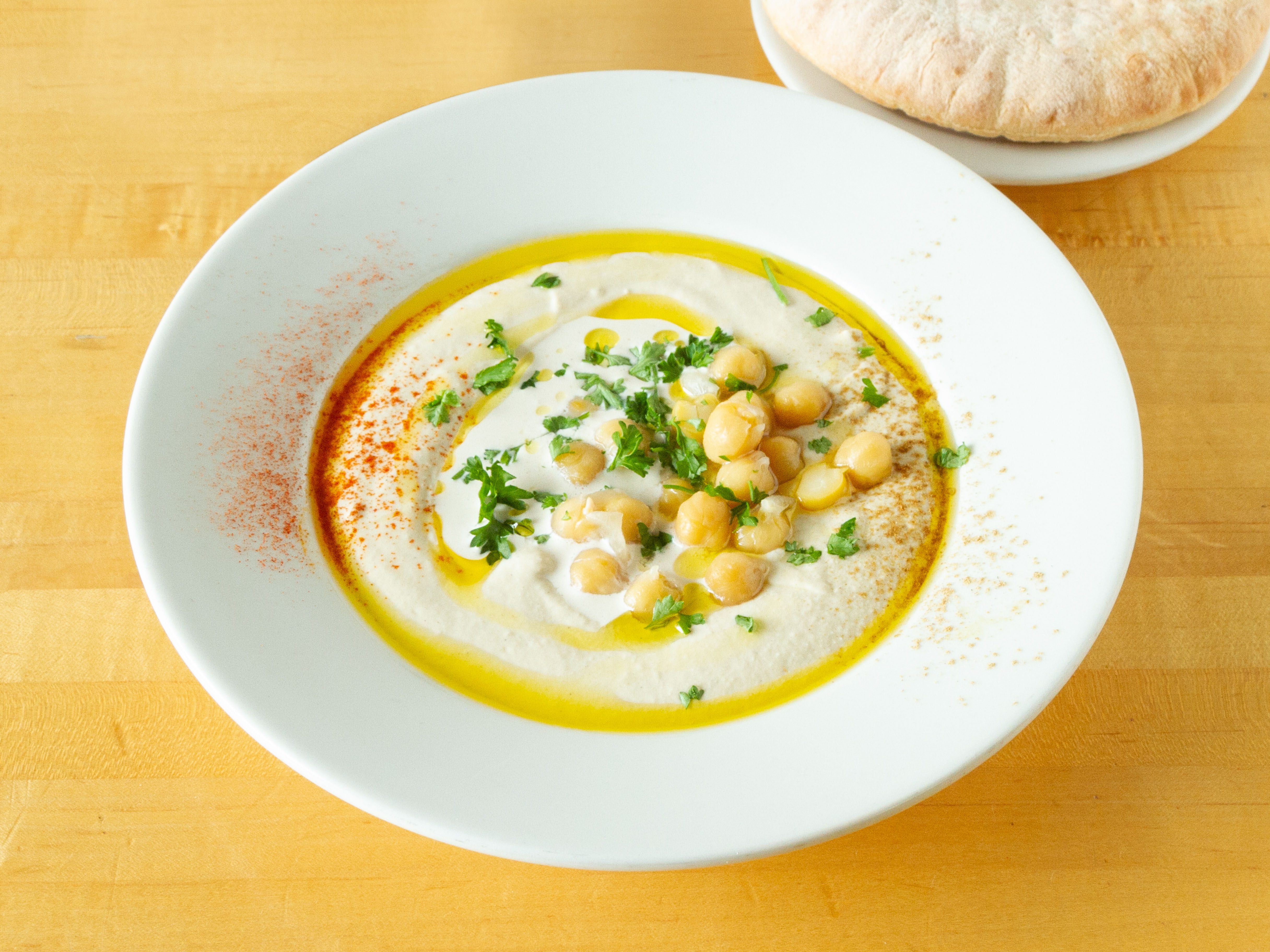 Order Hummus Platter with Chickpeas food online from Adea Mediterranean Kitchen store, Salem on bringmethat.com