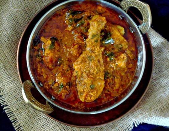 Order Kozhi Varutha Curry food online from Bawarchi Biryani store, Franklin on bringmethat.com