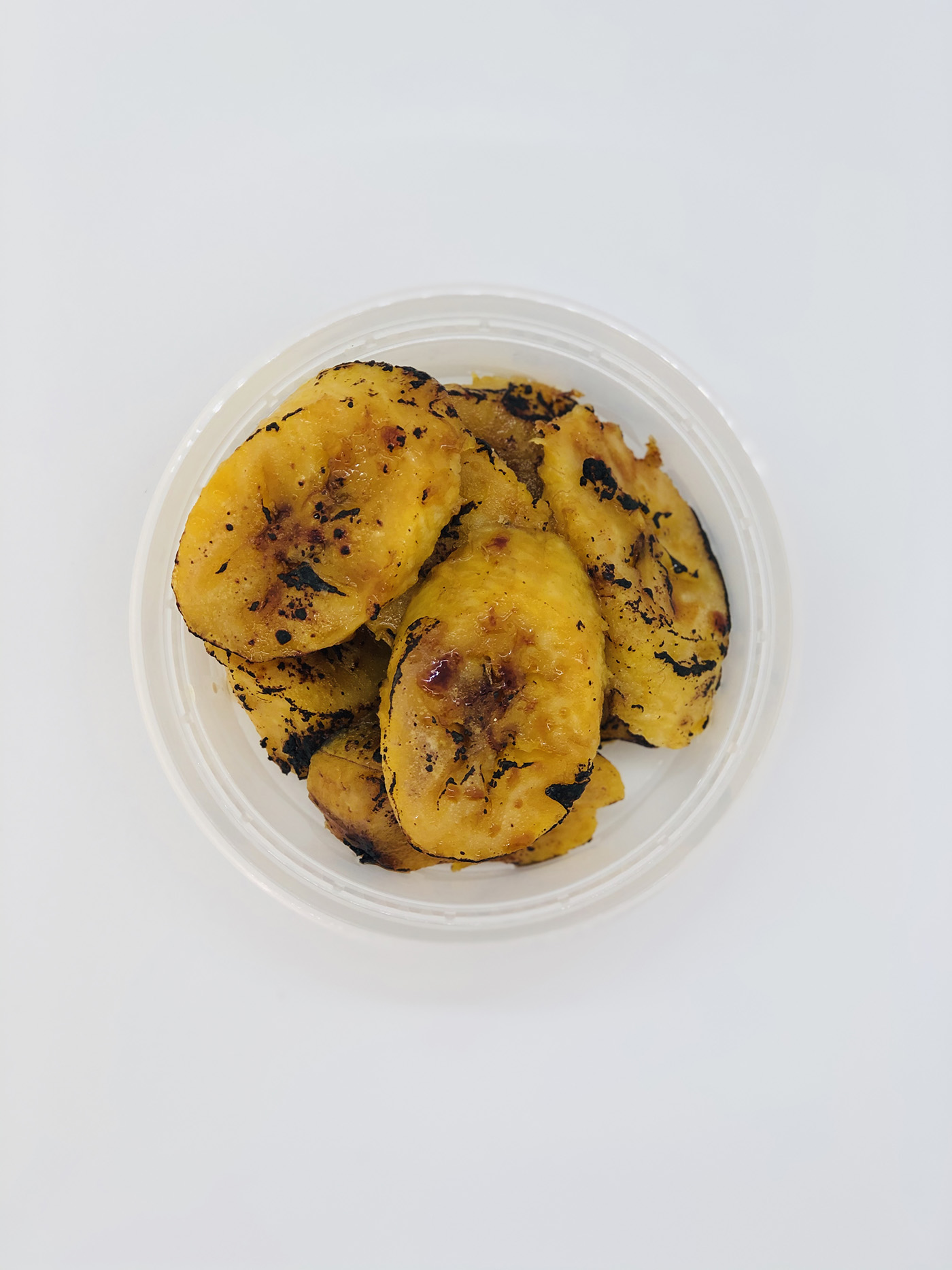 Order Baked Plantains (QUART) food online from The Arepa Stand store, Redondo Beach on bringmethat.com