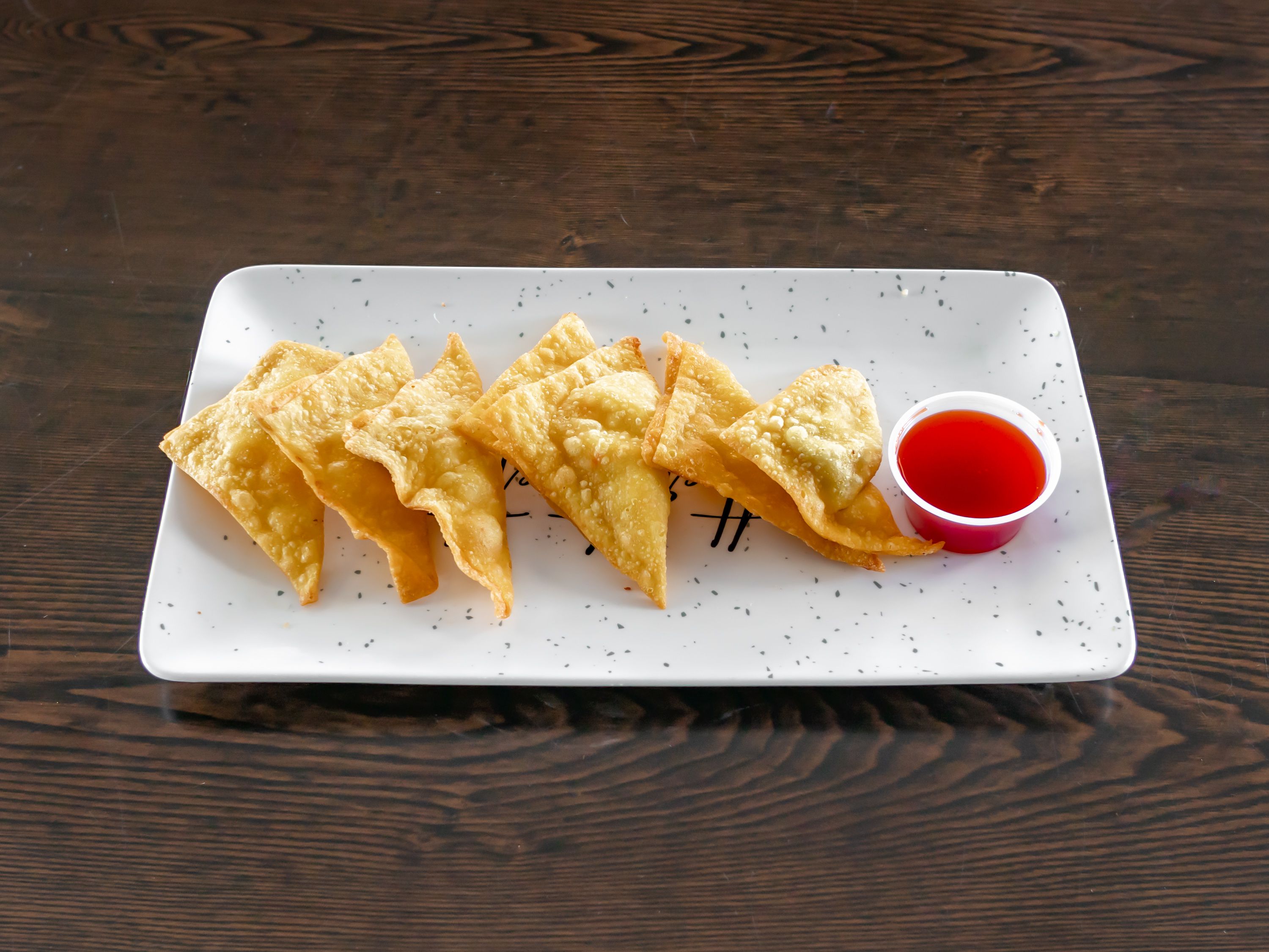 Order 8 Piece Crab Rangoon food online from China Wing Basket store, Columbia on bringmethat.com
