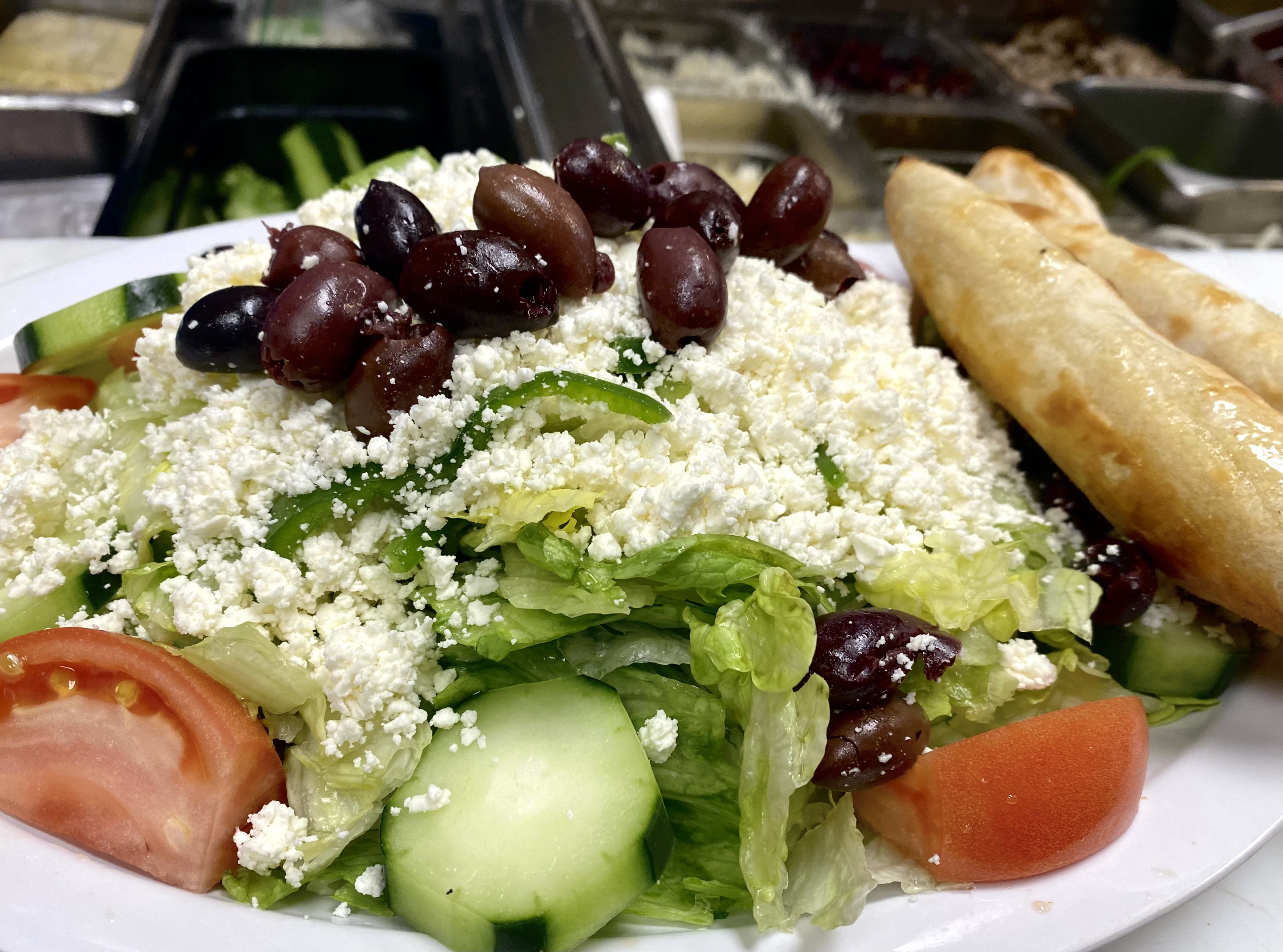 Order Greek Salad  food online from Luisa's Italian Pizzeria store, Manchester on bringmethat.com
