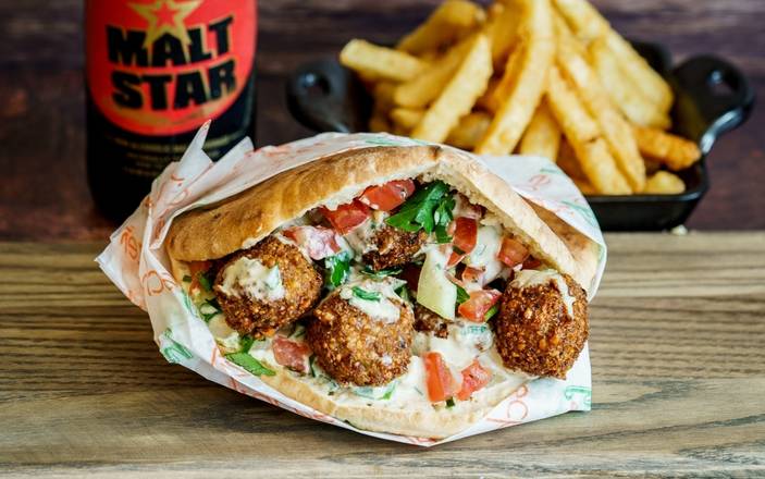 Order Falafel In A Pita food online from Holy Schnitzel store, New York on bringmethat.com