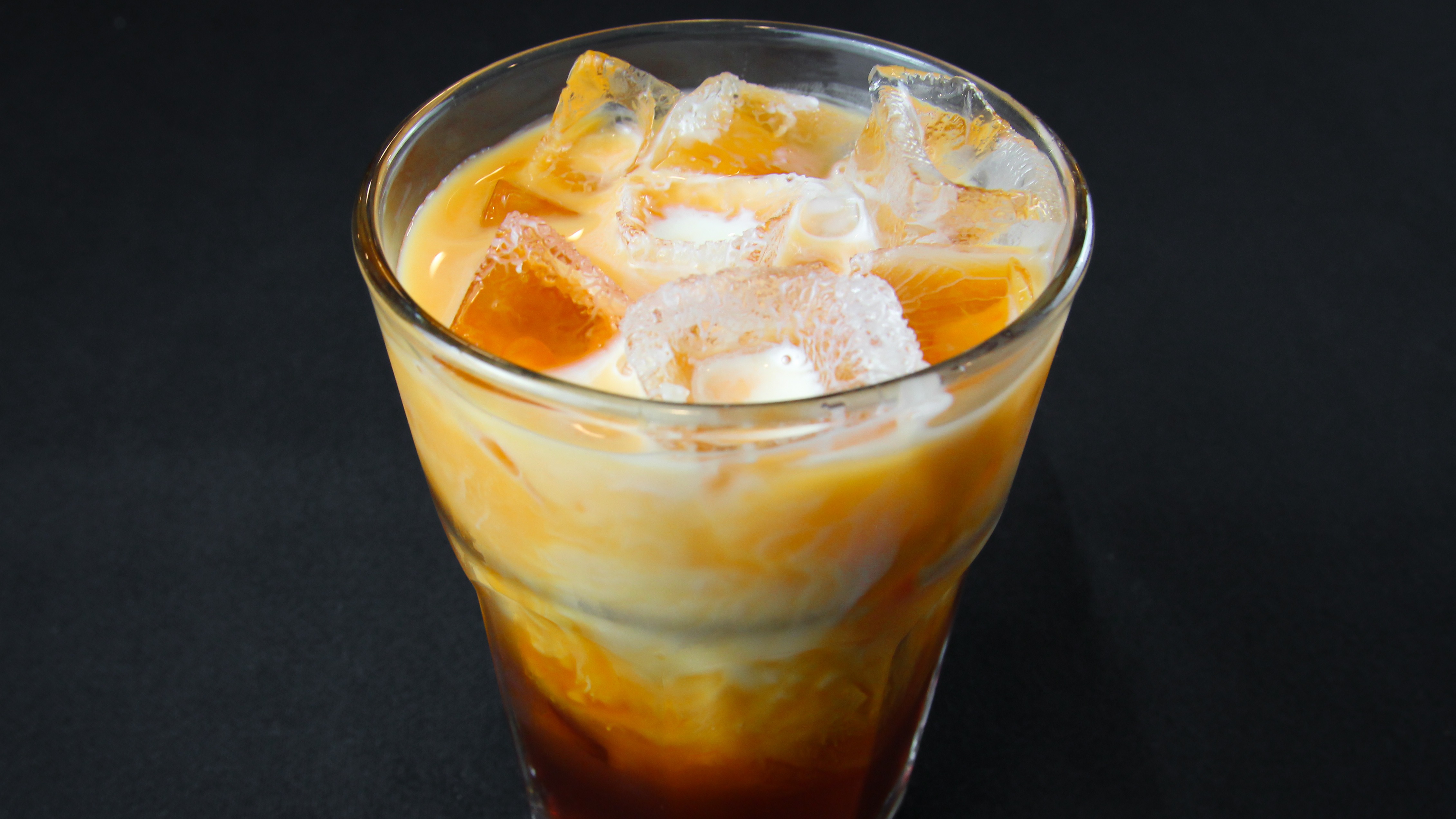 Order Thai Iced Tea Can food online from Basil Thai Cafe store, Columbus on bringmethat.com
