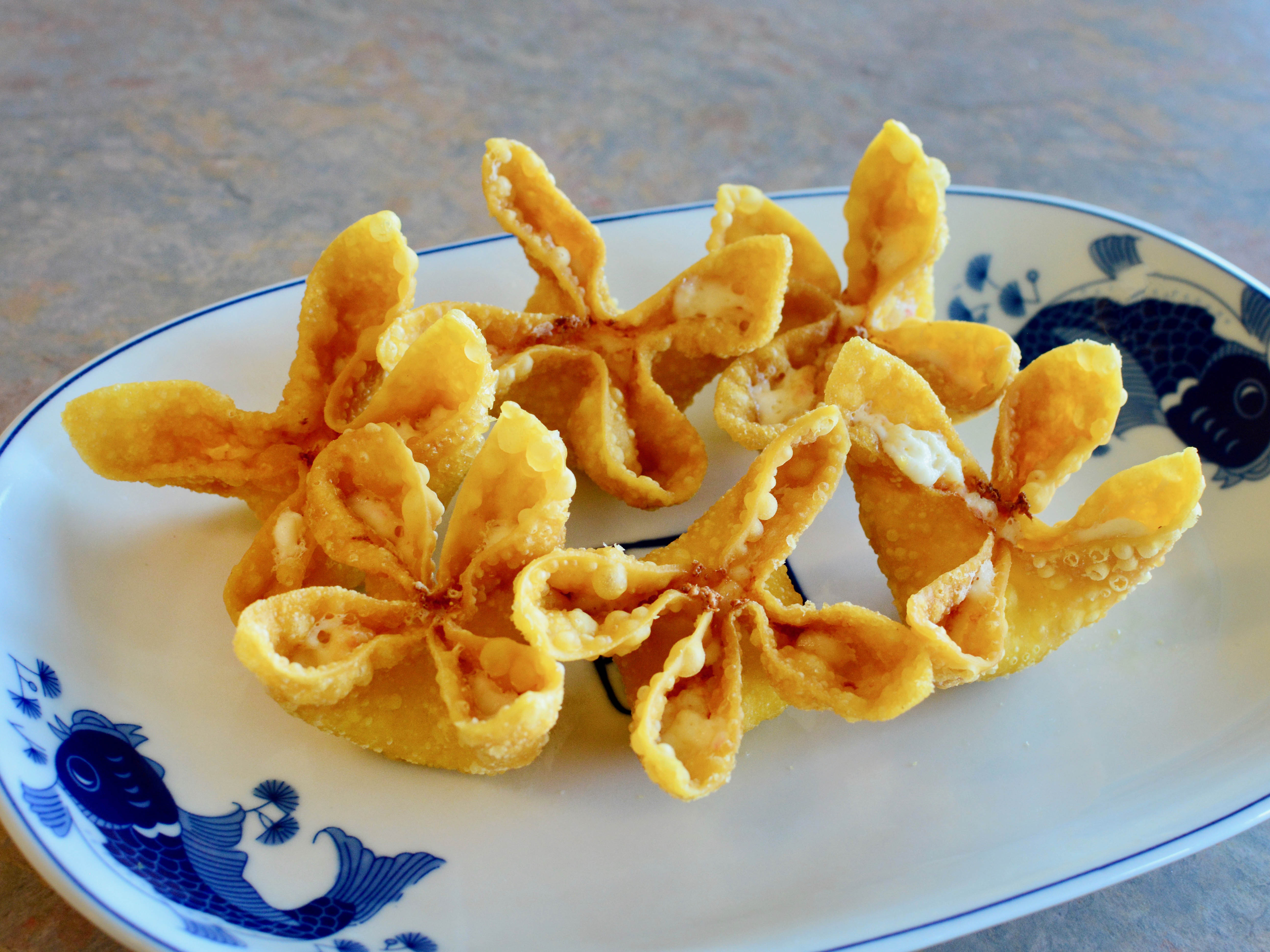 Order 4. Crab Rangoon food online from Oriental Express store, Sterling on bringmethat.com