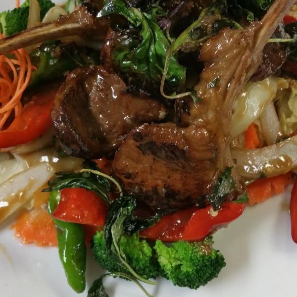 Order T7. Sweet Basil Lamb food online from Wild ginger thai restaurant store, Atlanta on bringmethat.com