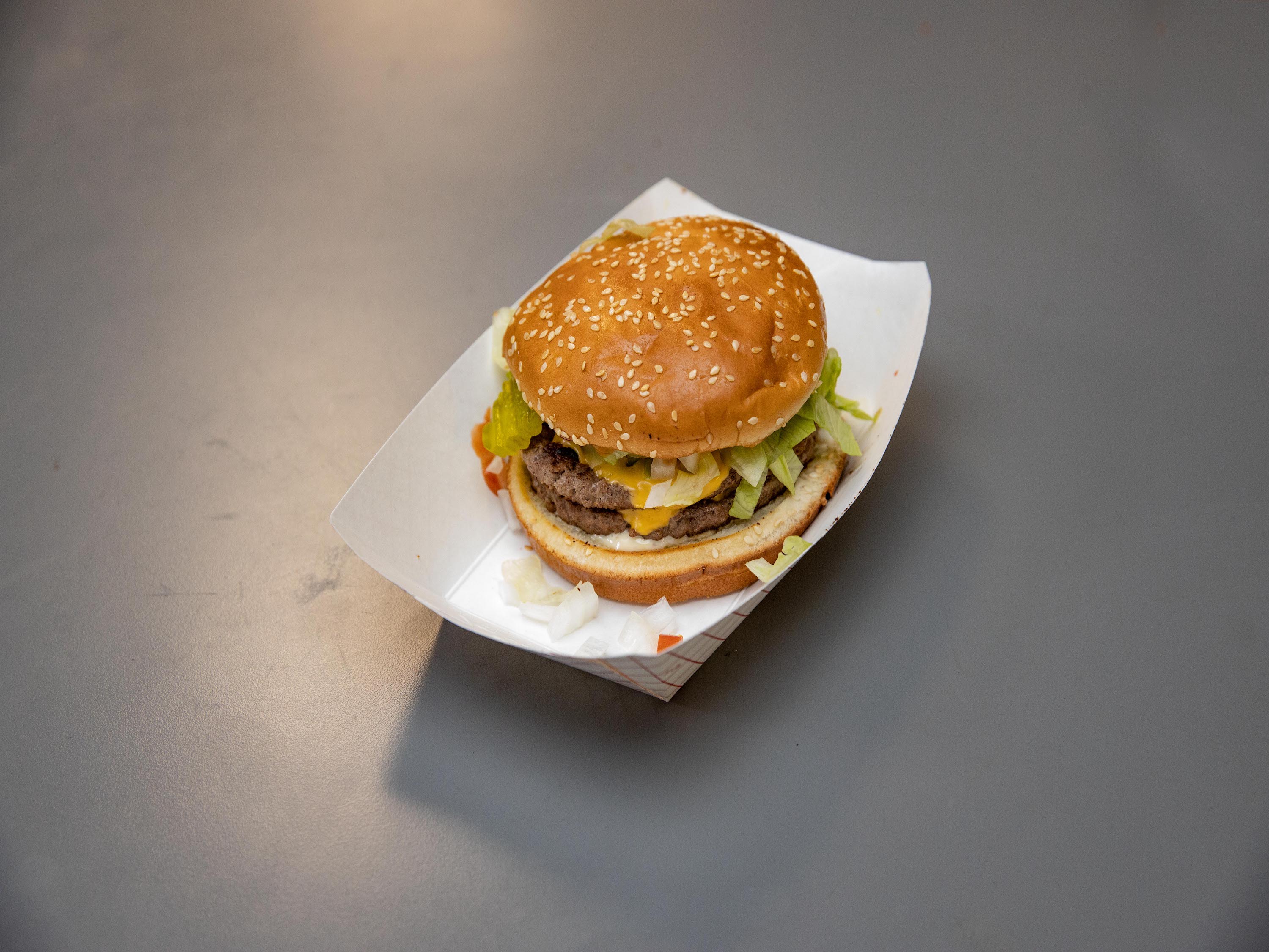 Order 5 oz. Cheeseburger food online from Slide In Mart & Grill store, Saint Cloud on bringmethat.com