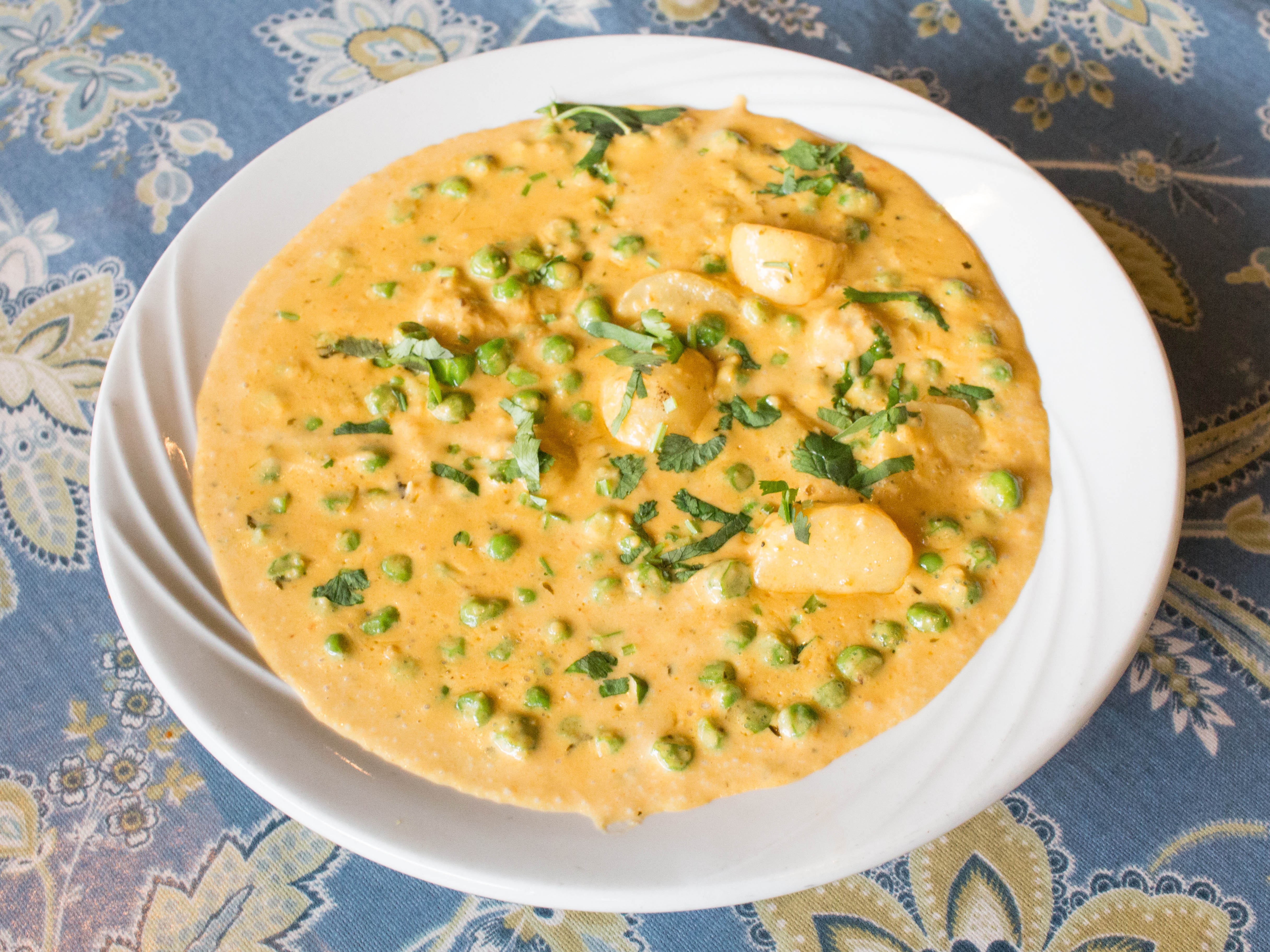 Order Aloo Mutter food online from Priya Indian Cuisine store, Troy on bringmethat.com