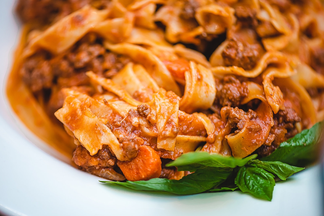 Order Pappardelle Bolognese food online from Gene & Georgetti store, Chicago on bringmethat.com